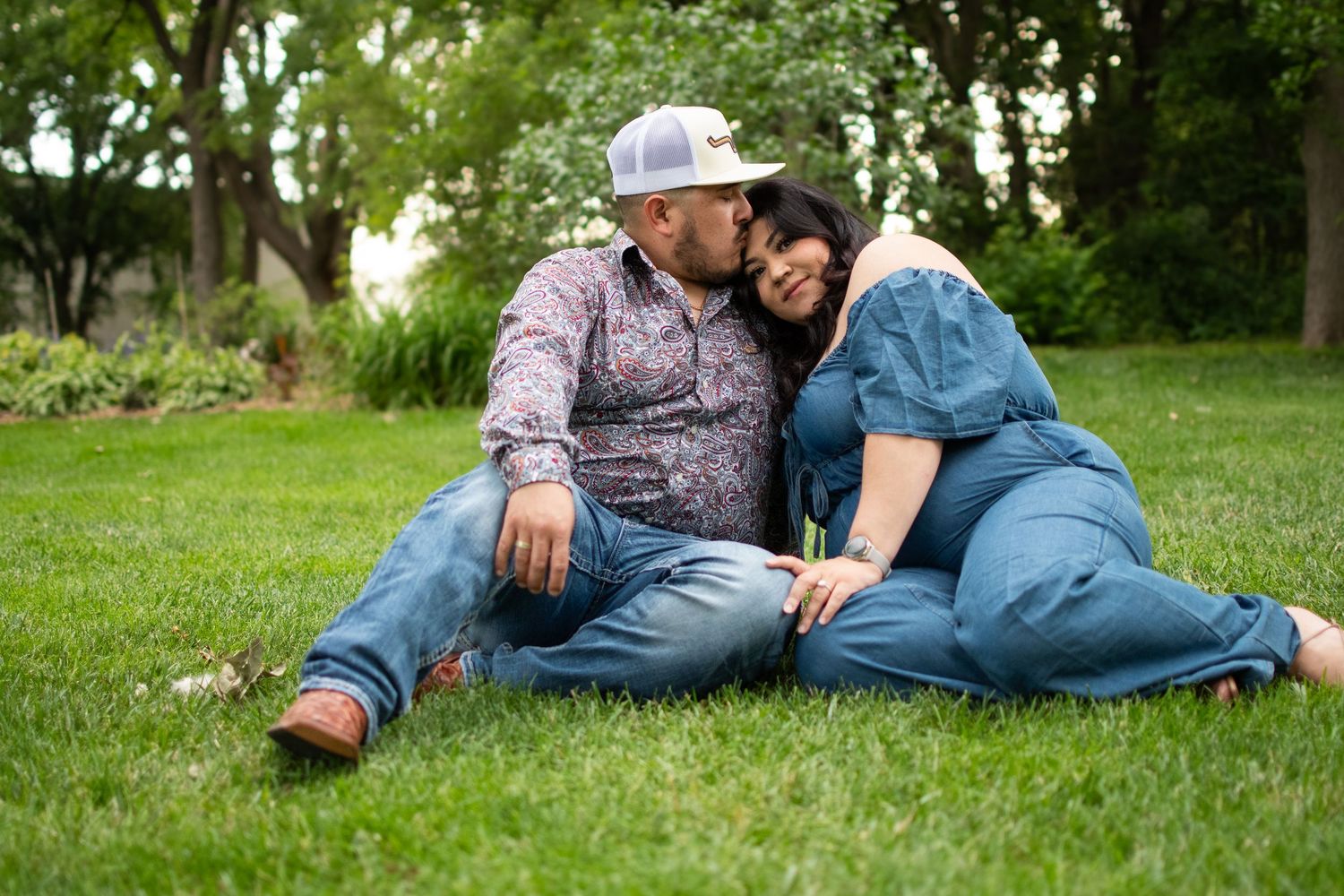 True-to-color portrait of an embracing couple in casual outfits at Hall County Park, Grand Island, Nebraska
