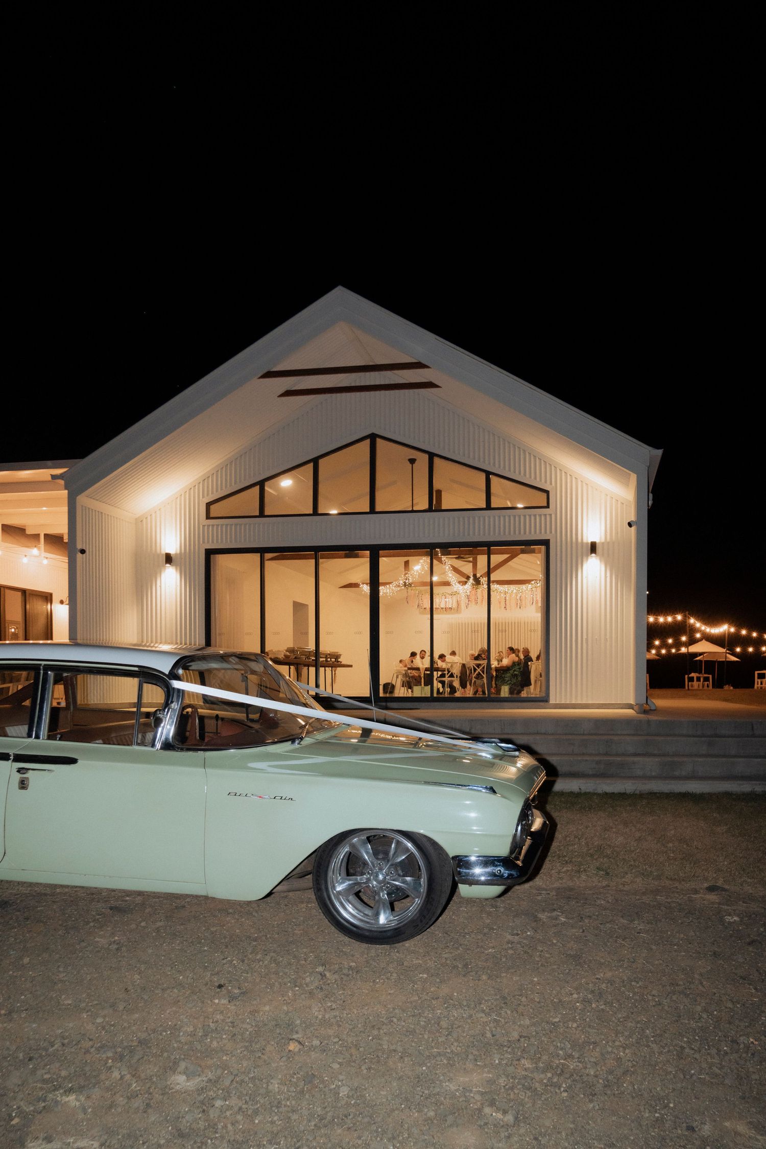 Evening reception with dancing and warm lighting at Maroon Hill Estate.