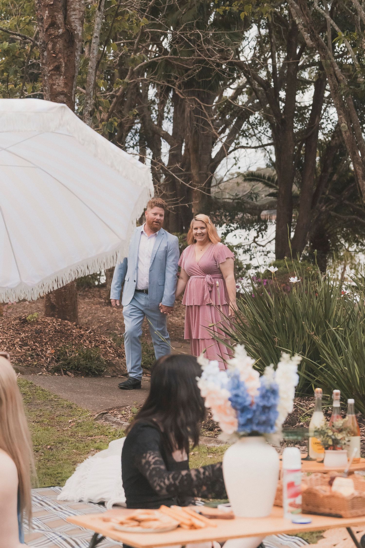 Floral setup and ceremony styling for a surprise vow renewal at Noosa Botanical Gardens, styled and photographed on the Sunshine Coast.