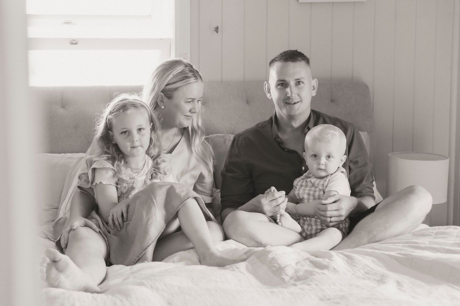 Family in Home session, bedroom cozy, near Plainland  photographed by family photographer for Ipswich Toowoomba Lockyer Valley. Documentary