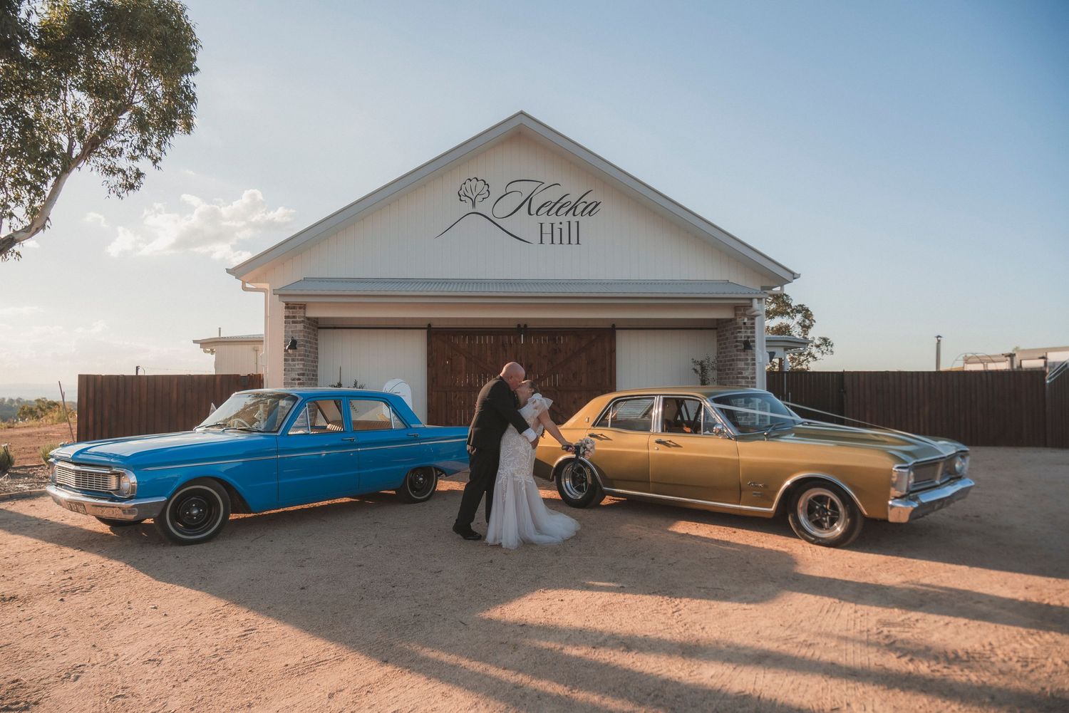 bride & groom During wedding photos at Keteka hilll, Crows Nest. bright golden hour photography. Shae Imagery wedding photographer