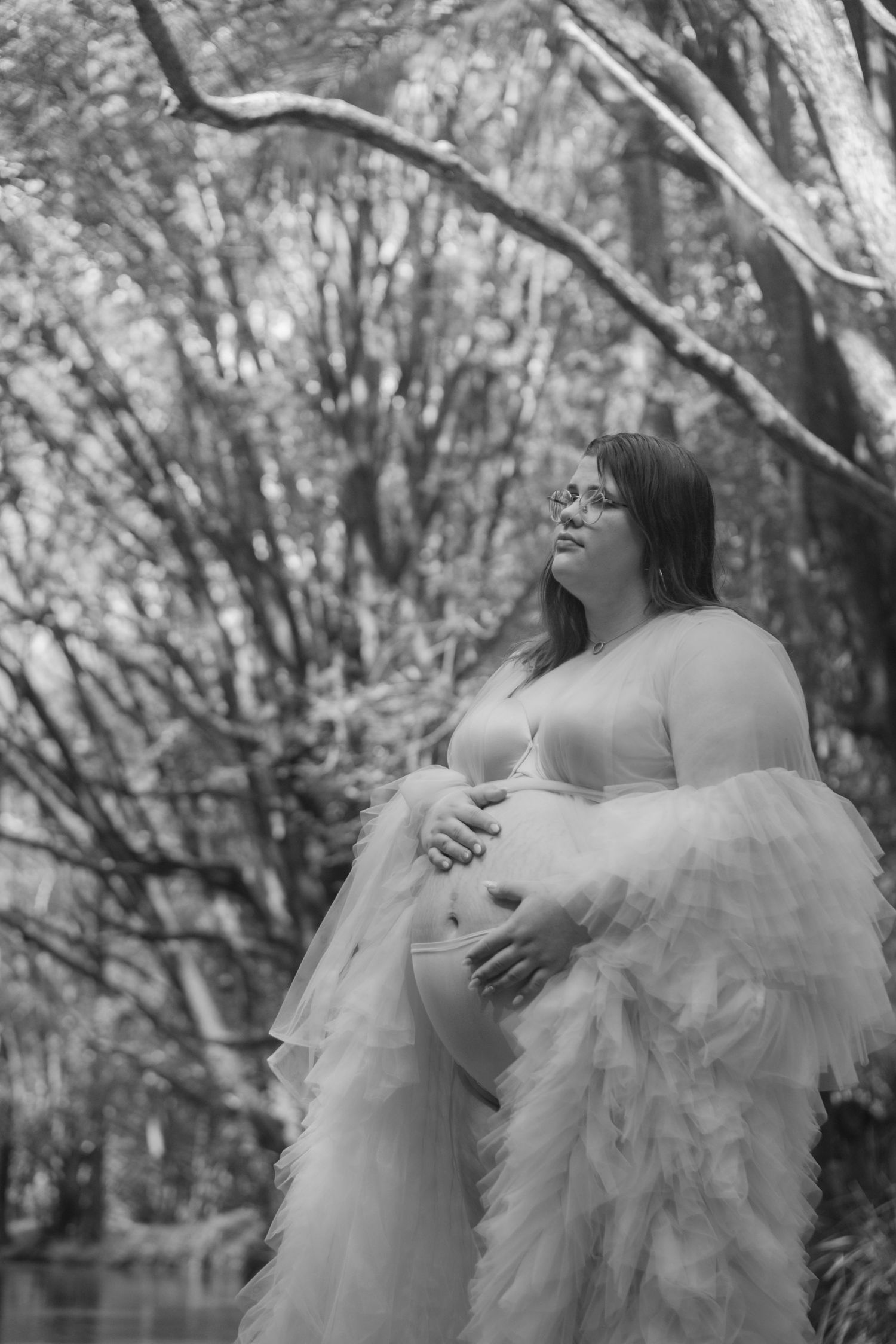 Outdoor maternity photography in South East Queensland landscape. Expecting Mother in tule gown, editorial newborn, maternity portrait photo