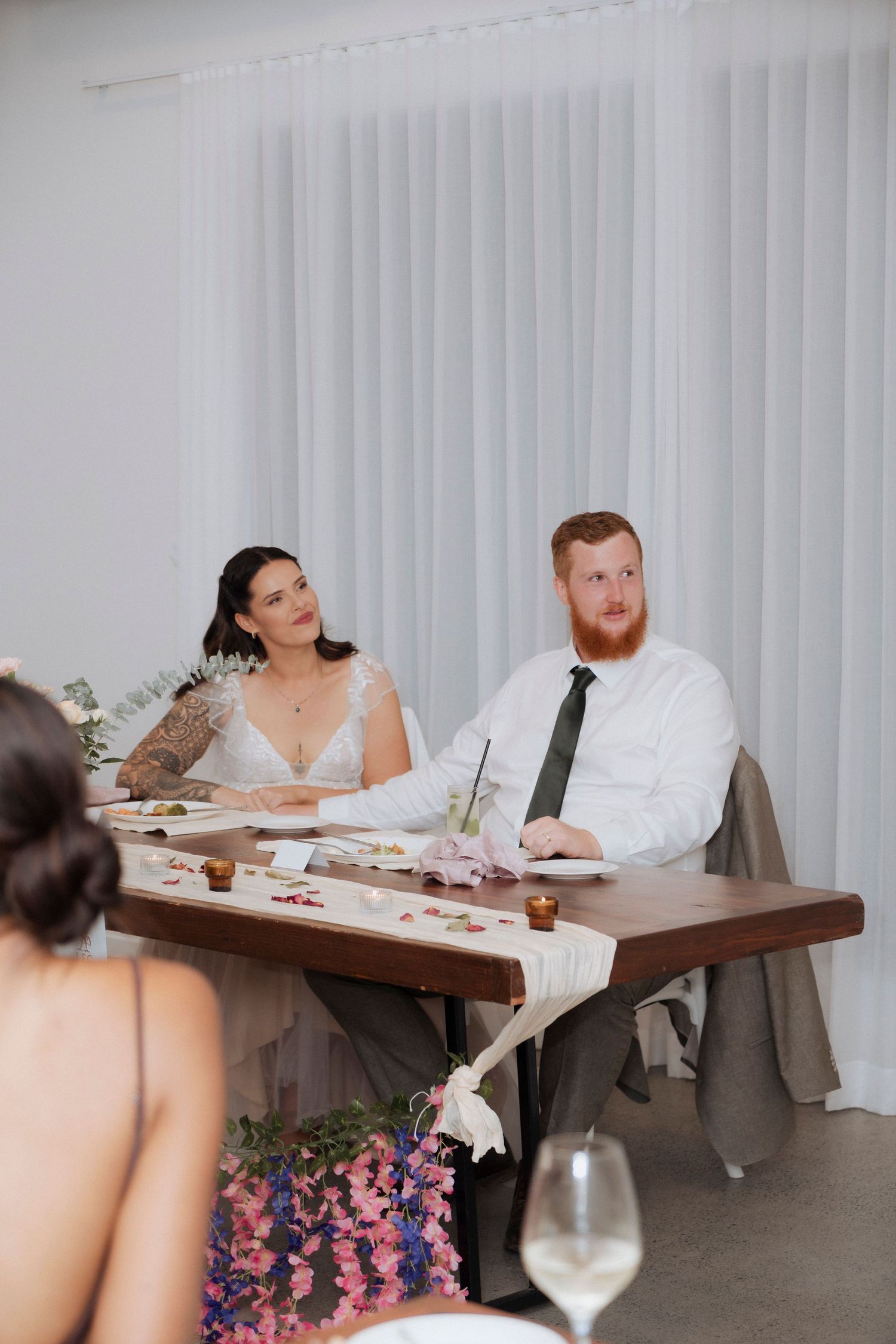 Candid reception moments captured with direct flash at Maroon Hill Estate.