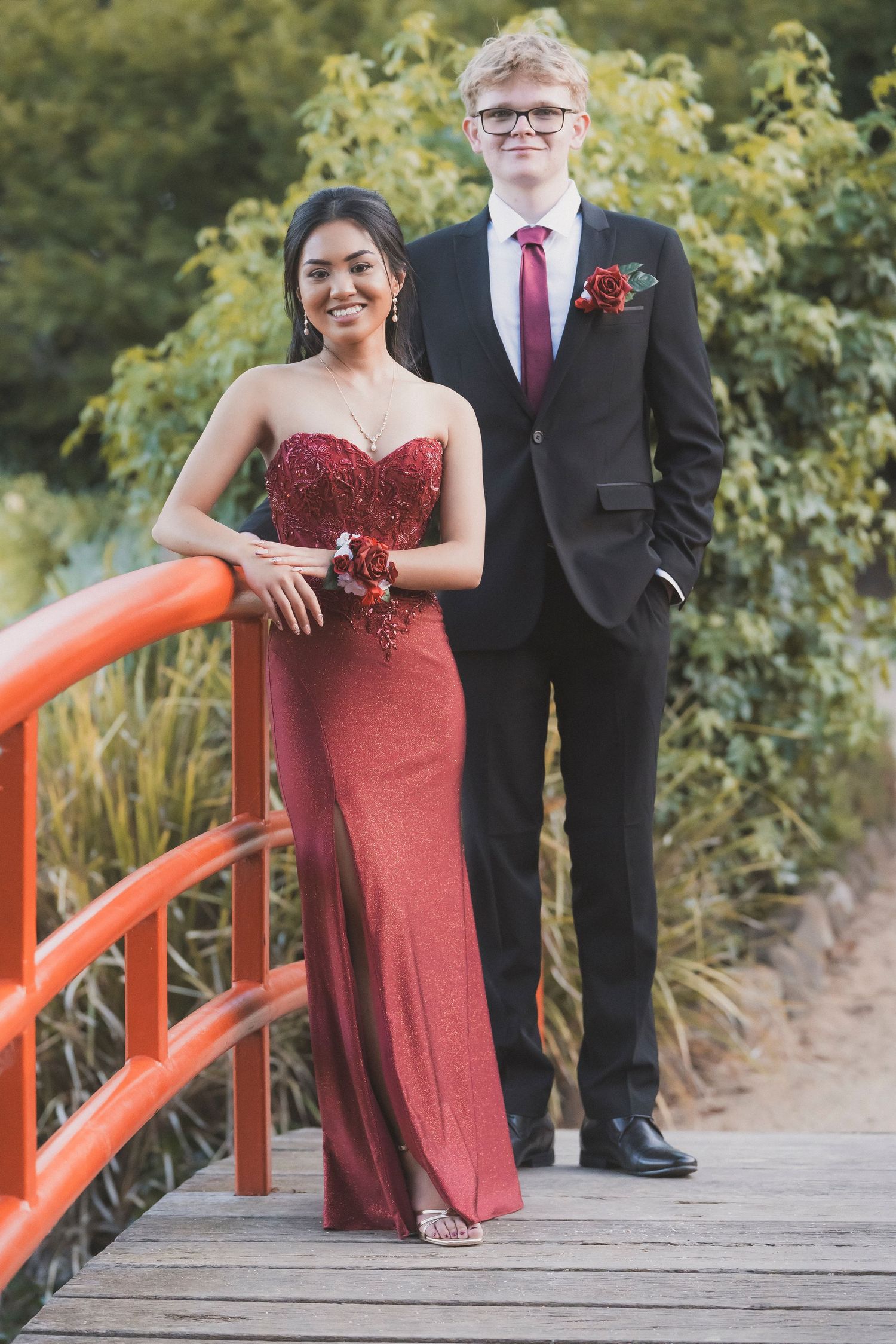 Couple at Japanese Gardens Toowoomba for pre-formal portraits red dress Redbridge photographed by Shae Imagery Toowoomba photographer