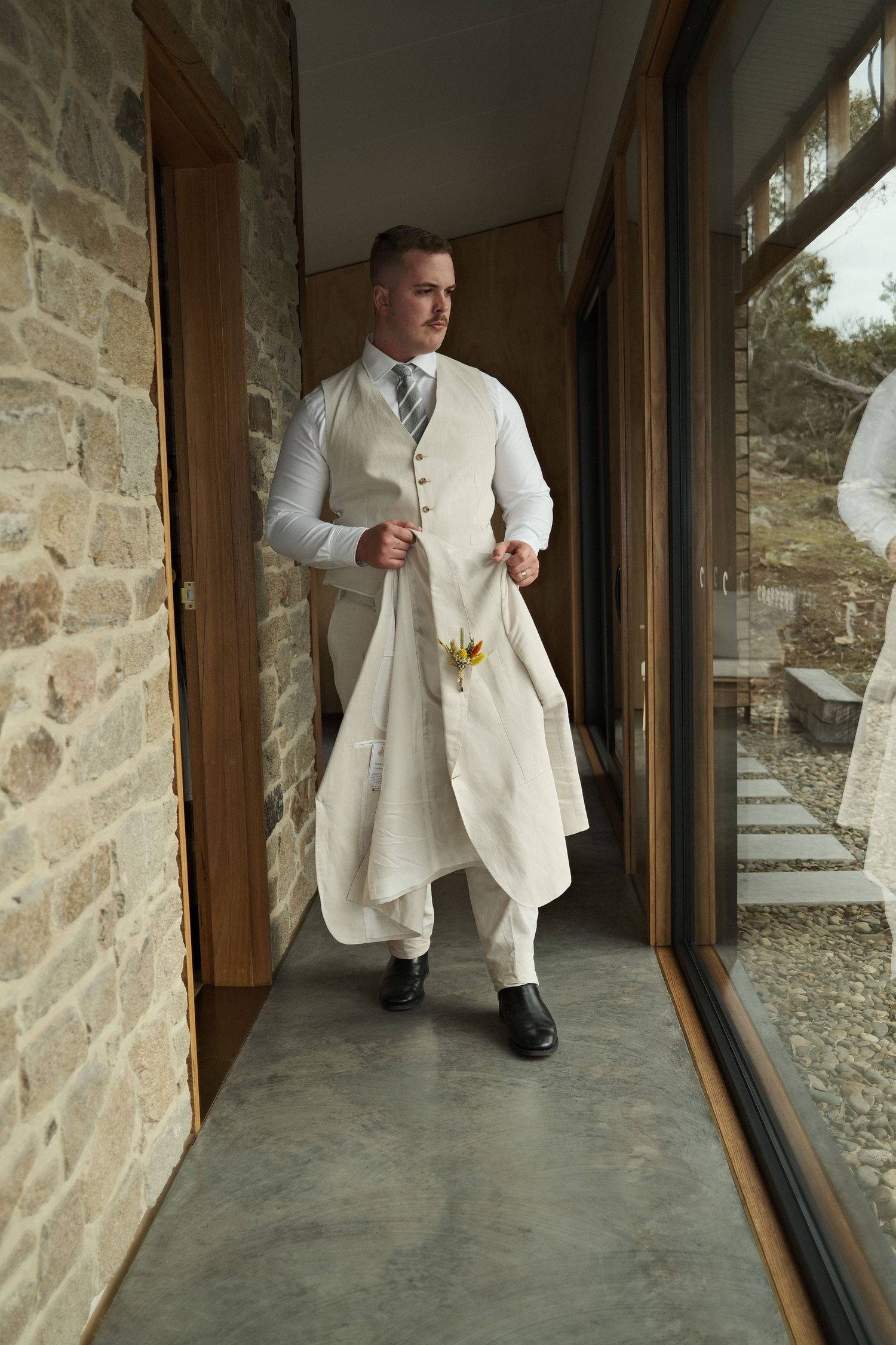 Groom, getting ready portraits from snowy Mountains Wedding. Photographed by Lockyer Valley, Toowoomba and Ipswich wedding photographer