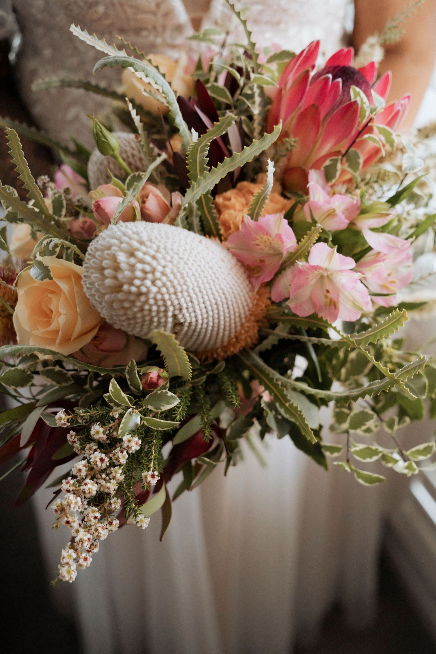 Romantic wedding photography overlooking Mount Maroon at Maroon Hill Estate. Native wedding flowers from brisbane flower market