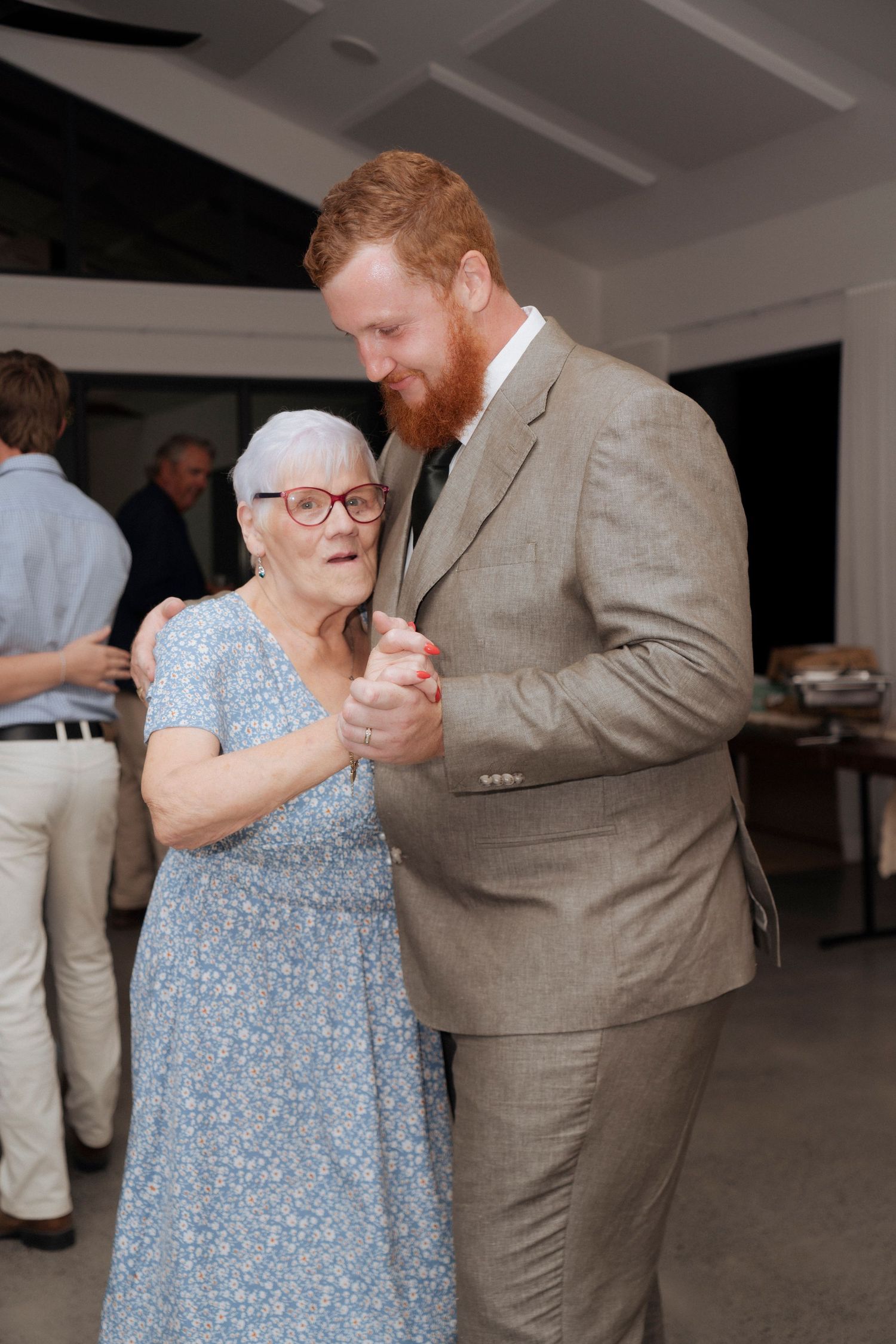 Candid wedding reception photo capturing the energy of the dance floor.