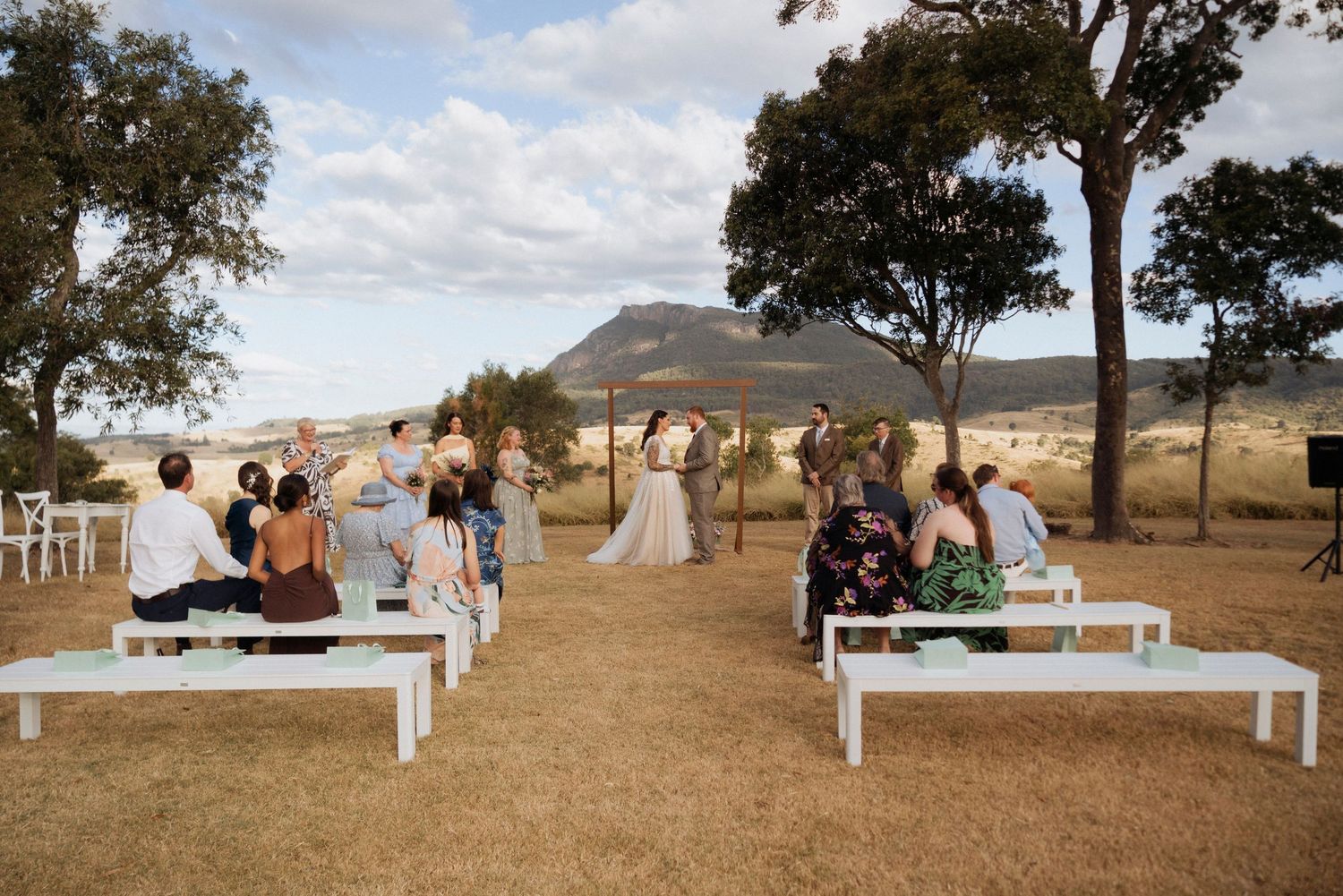 wide shot of ceremony at Maroon Hill Estate, mountain backdrop ceremony in SEQ editorial wedding photography shae imagery