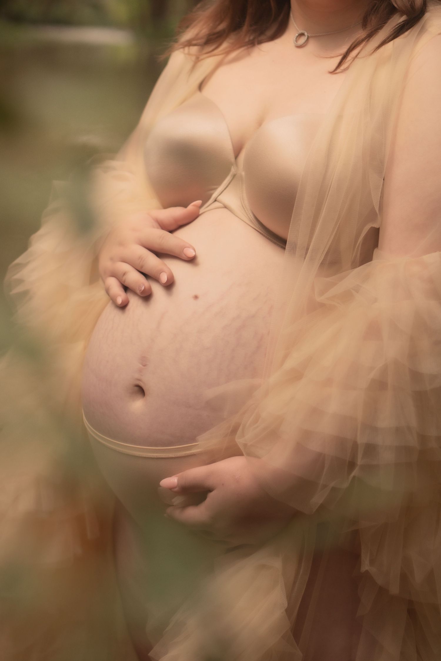 Expecting mother in flowing dress during Lockyer Valley maternity session. Maternity and newborn photography gentle raw moments