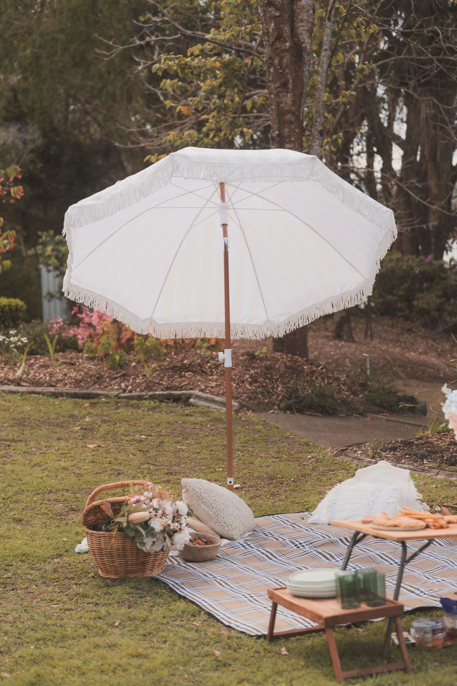 Floral setup and ceremony styling for a surprise vow renewal at Noosa Botanical Gardens, styled and photographed on the Sunshine Coast.