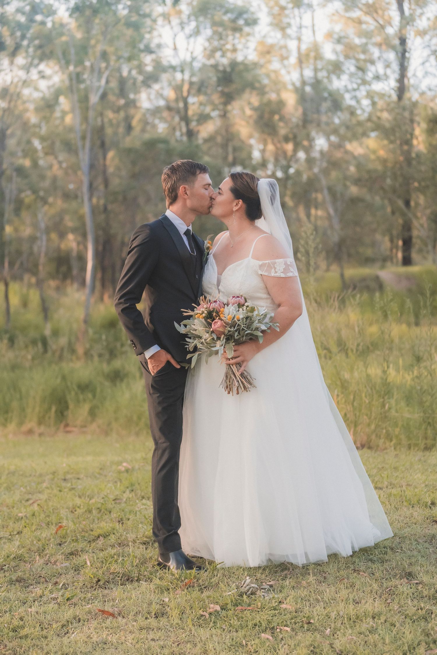 Bride and groom portraits in Glenore Grove at golden hour surrounded by trees lockyer valley wedding photographer shae imagery