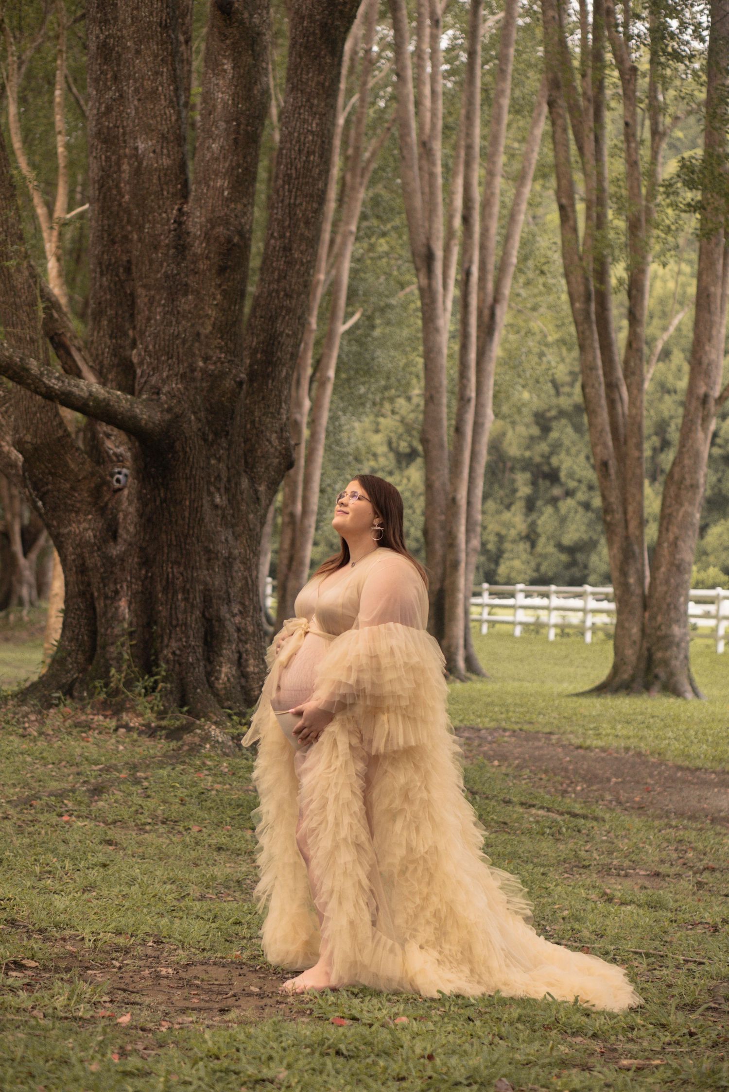 Outdoor maternity photography in South East Queensland landscape. Expecting Mother in tule gown, editorial newborn, maternity portrait photo