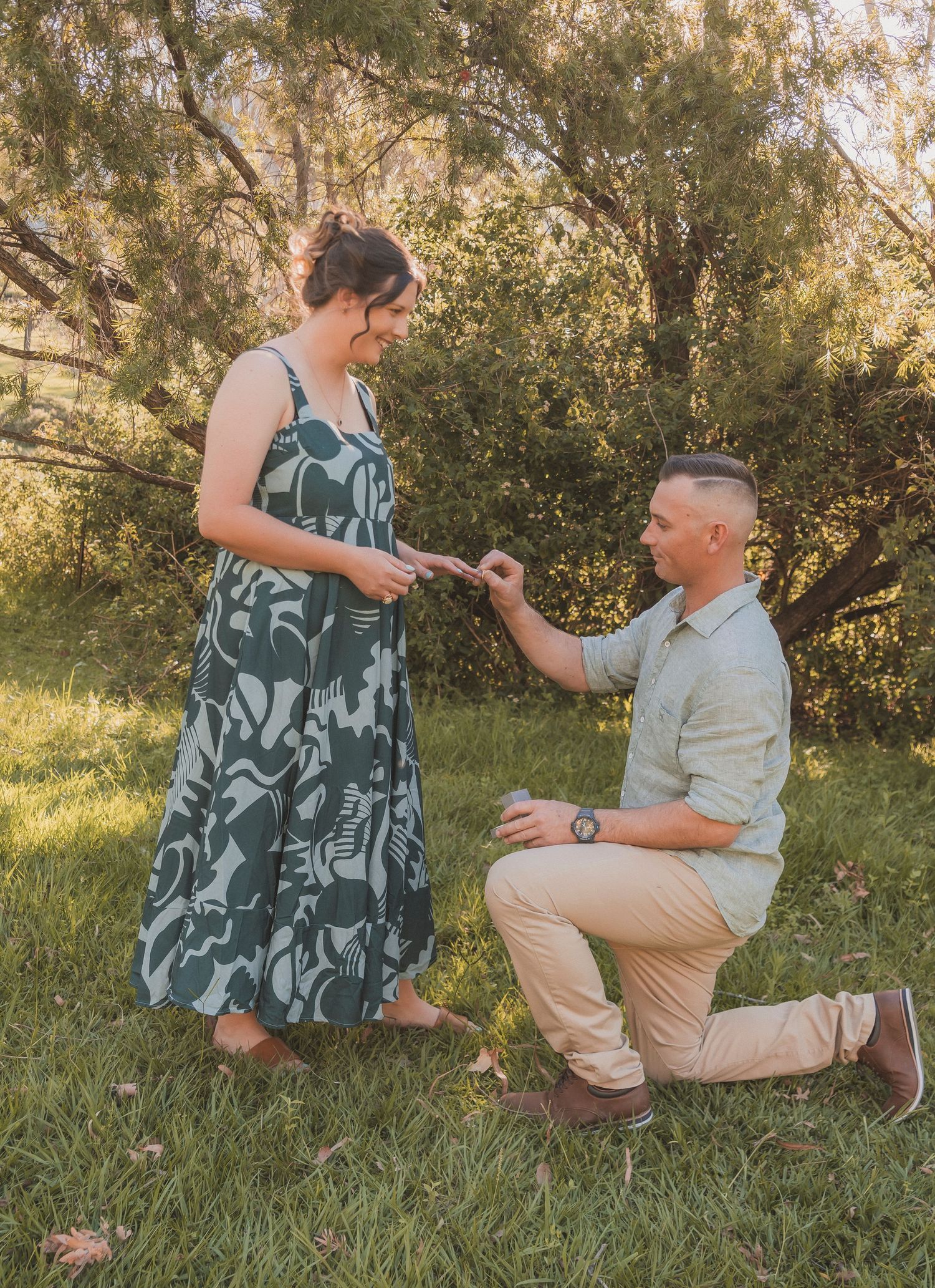 Candid proposal photography with hidden photographer capturing reaction Lockyer Valley country proposal Shae Imagery