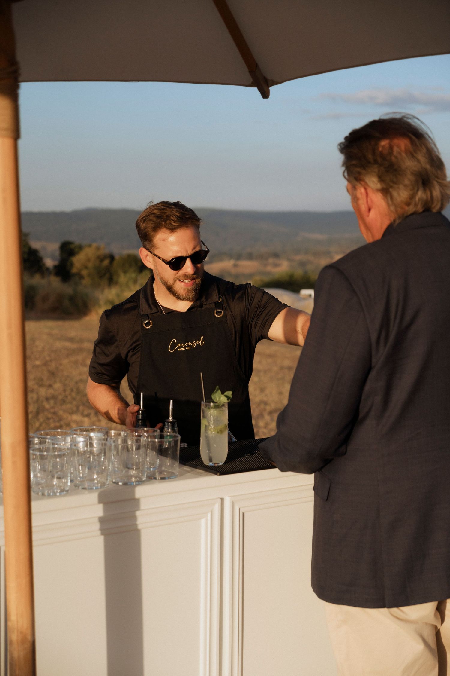 pop up bartending at Maroon Hill estate scenic rim wedding and events documentary wedding photography during Cocktail hour