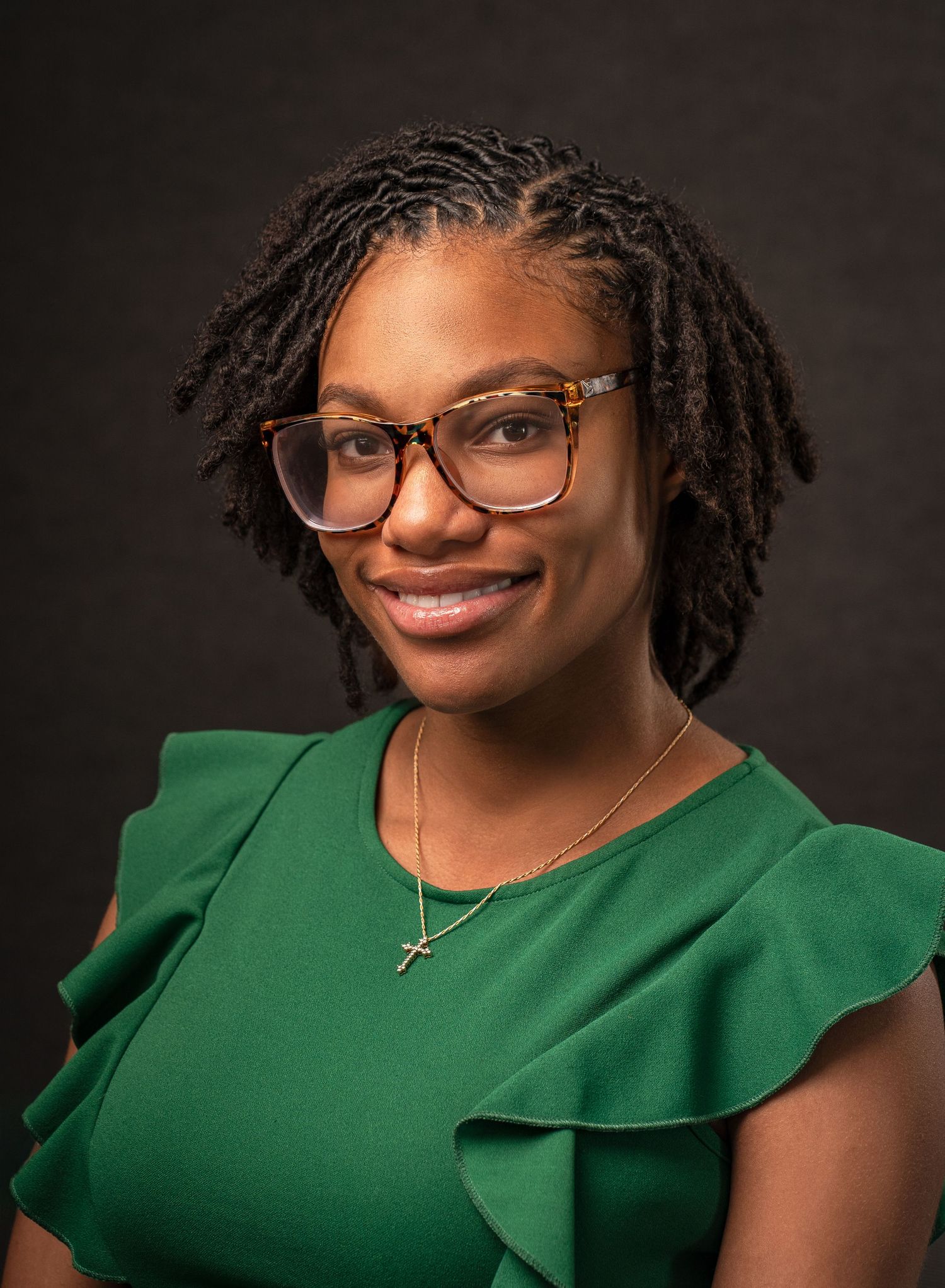 Studio headshot of a black woman for LinkedIn and company branding by Murray Vision Photography on location in Atlanta