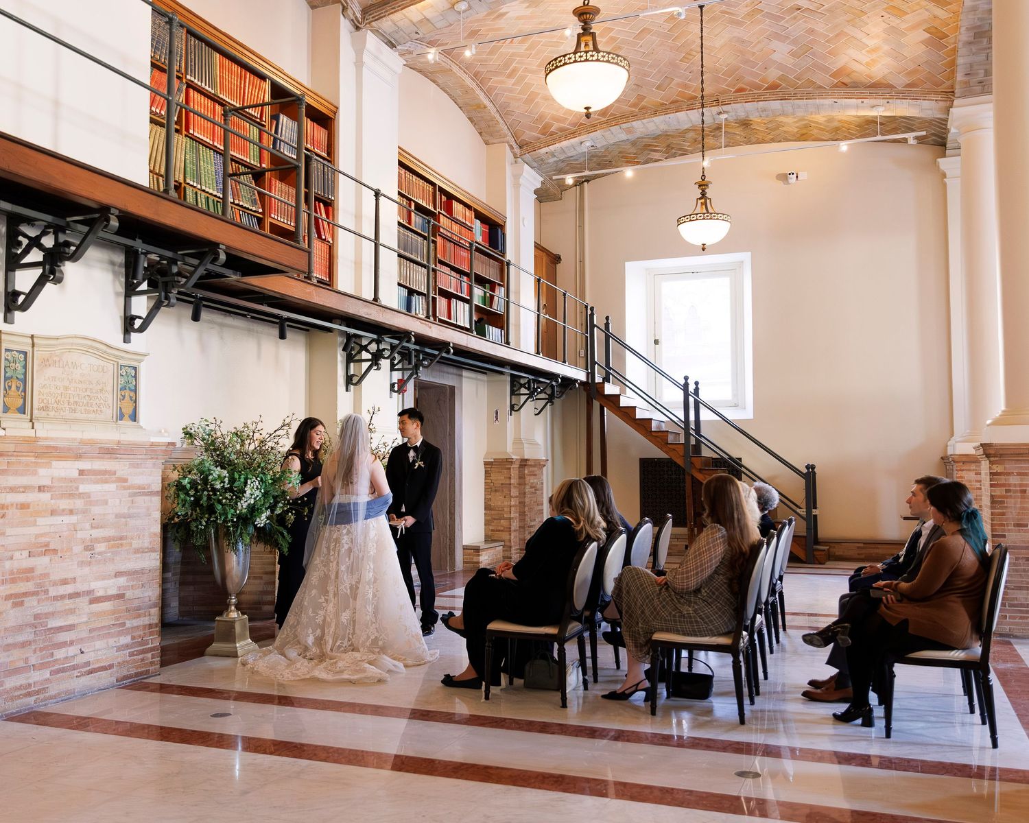 Romantic wedding portraits of a couple tucked away in the historic book stacks of the Boston Public Library.