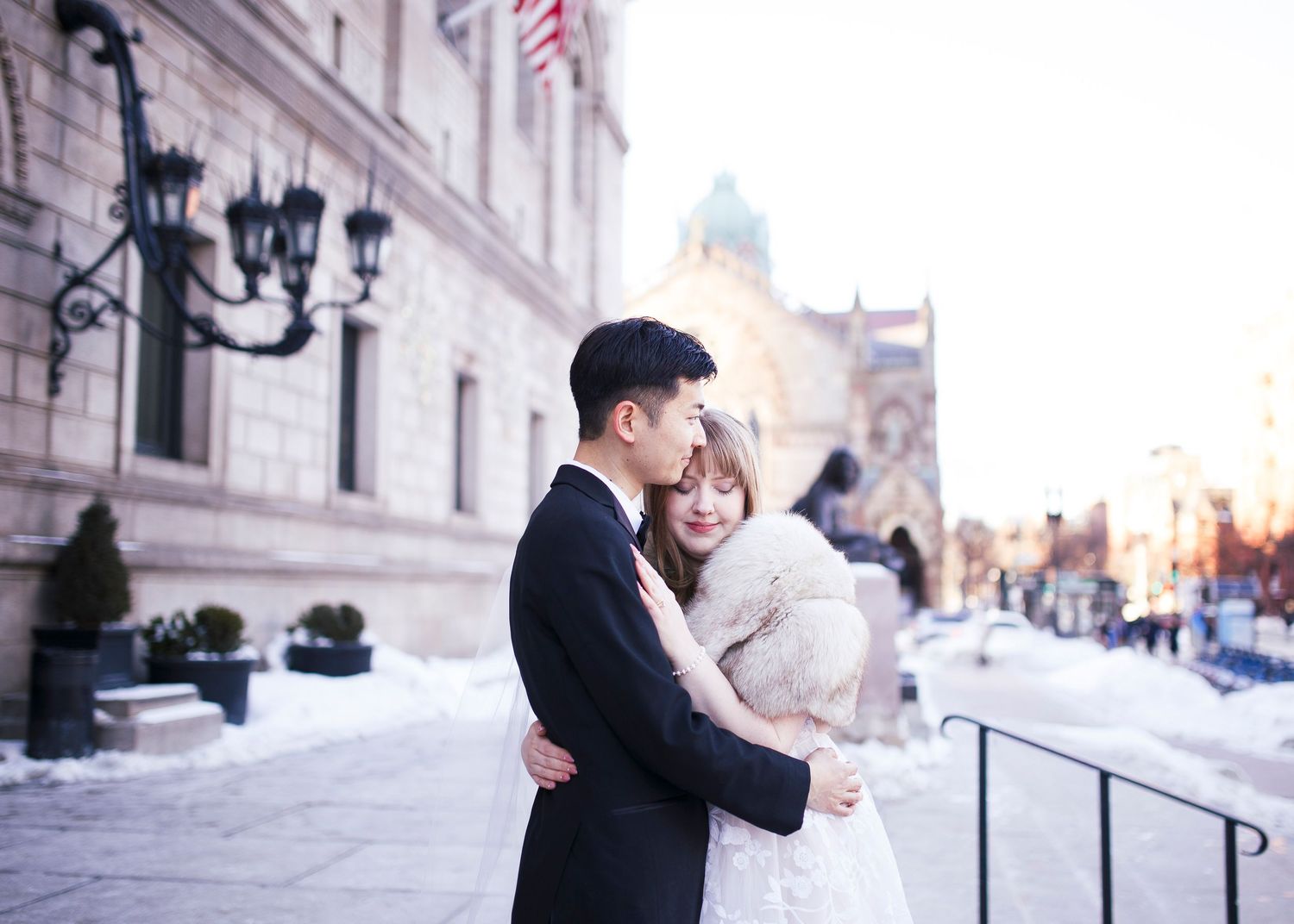 Winter wedding portraits in Copley Square Boston