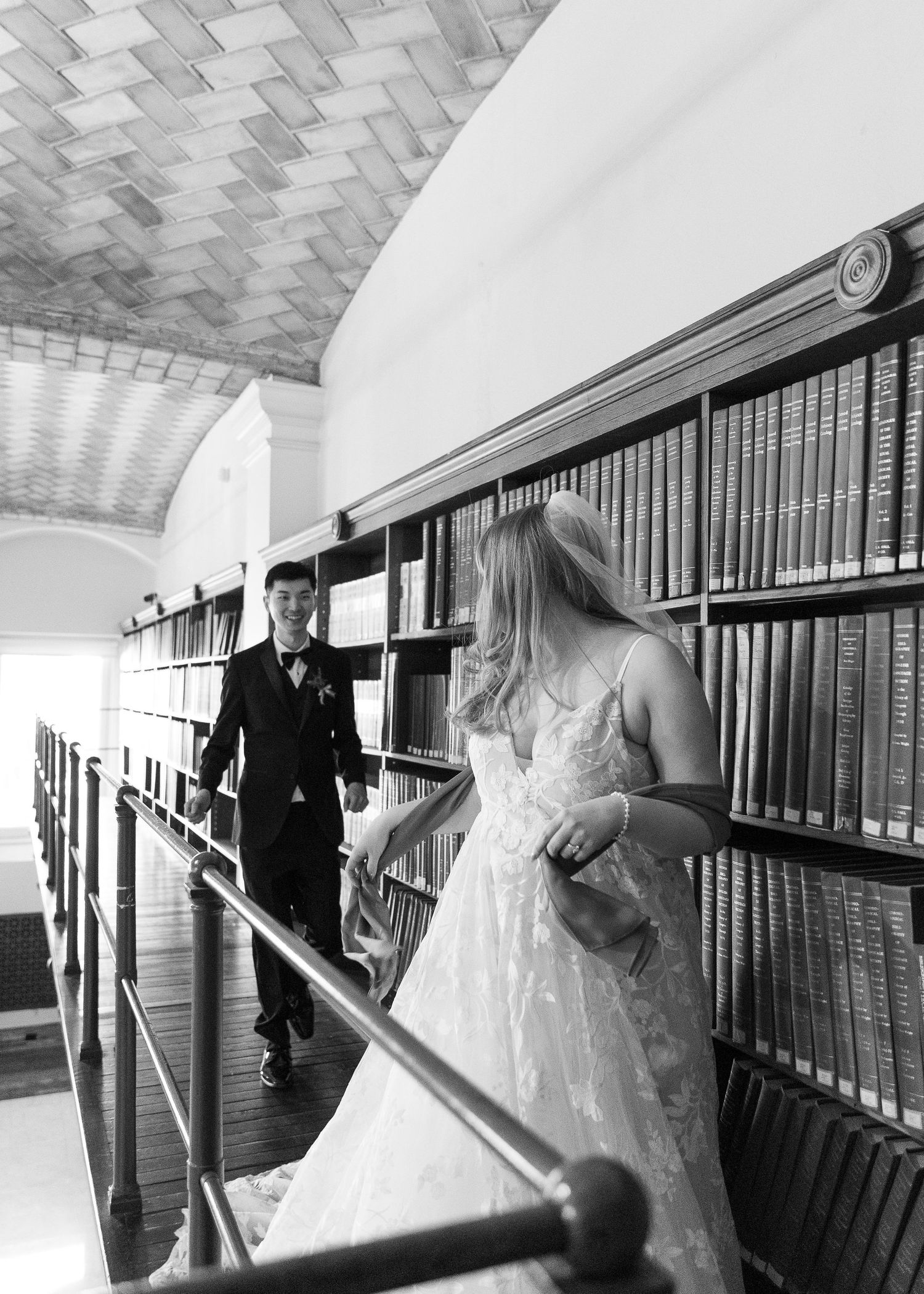 Intimate wedding ceremony in the Guastavino Room at the Boston Public Library with bright winter light.