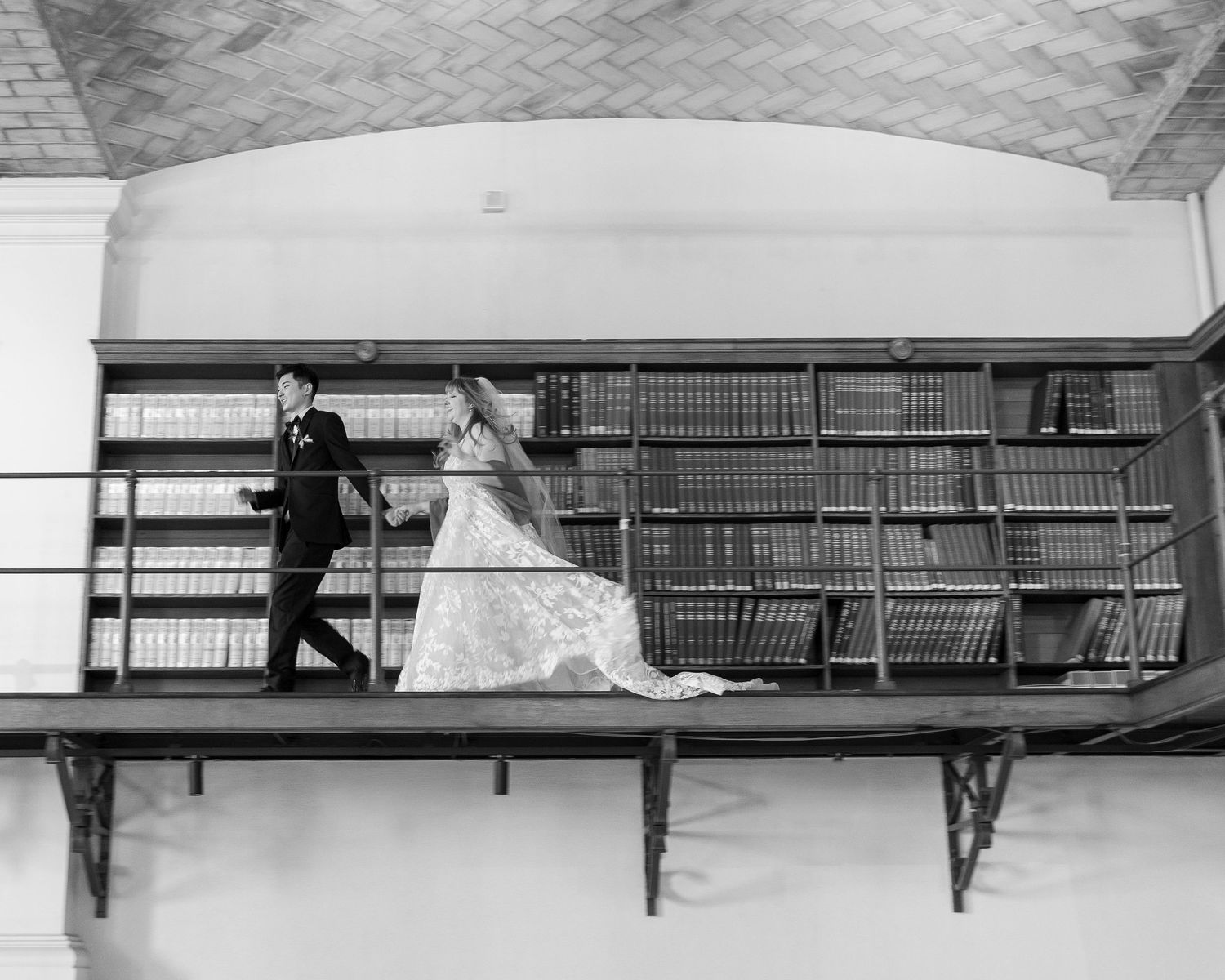 Intimate wedding ceremony in the Guastavino Room at the Boston Public Library with bright winter light.