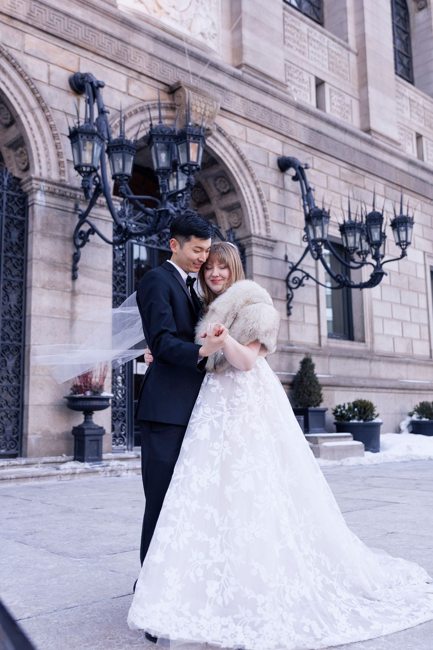 Winter wedding portraits in Copley Square Boston