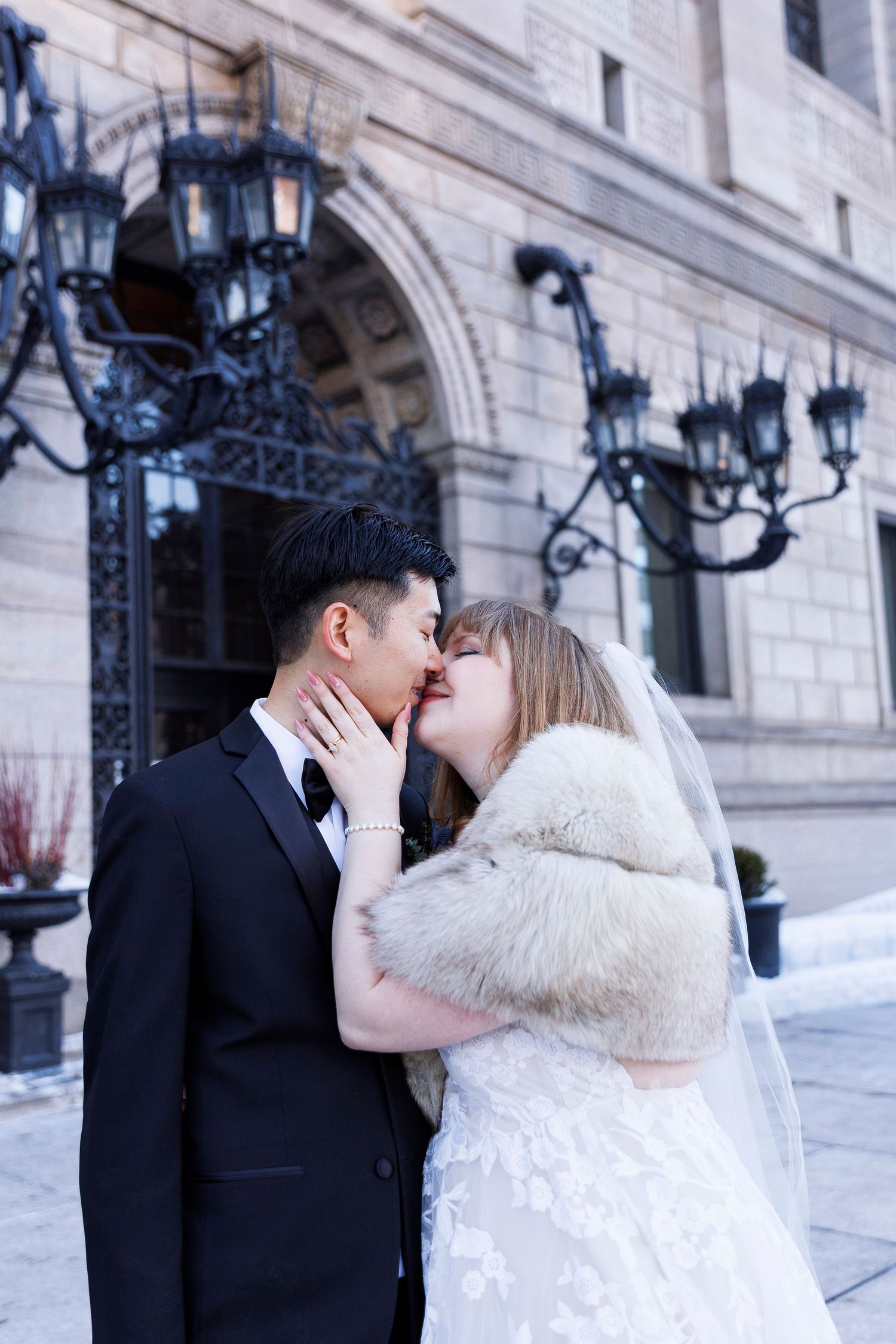 Winter wedding portraits in Copley Square Boston