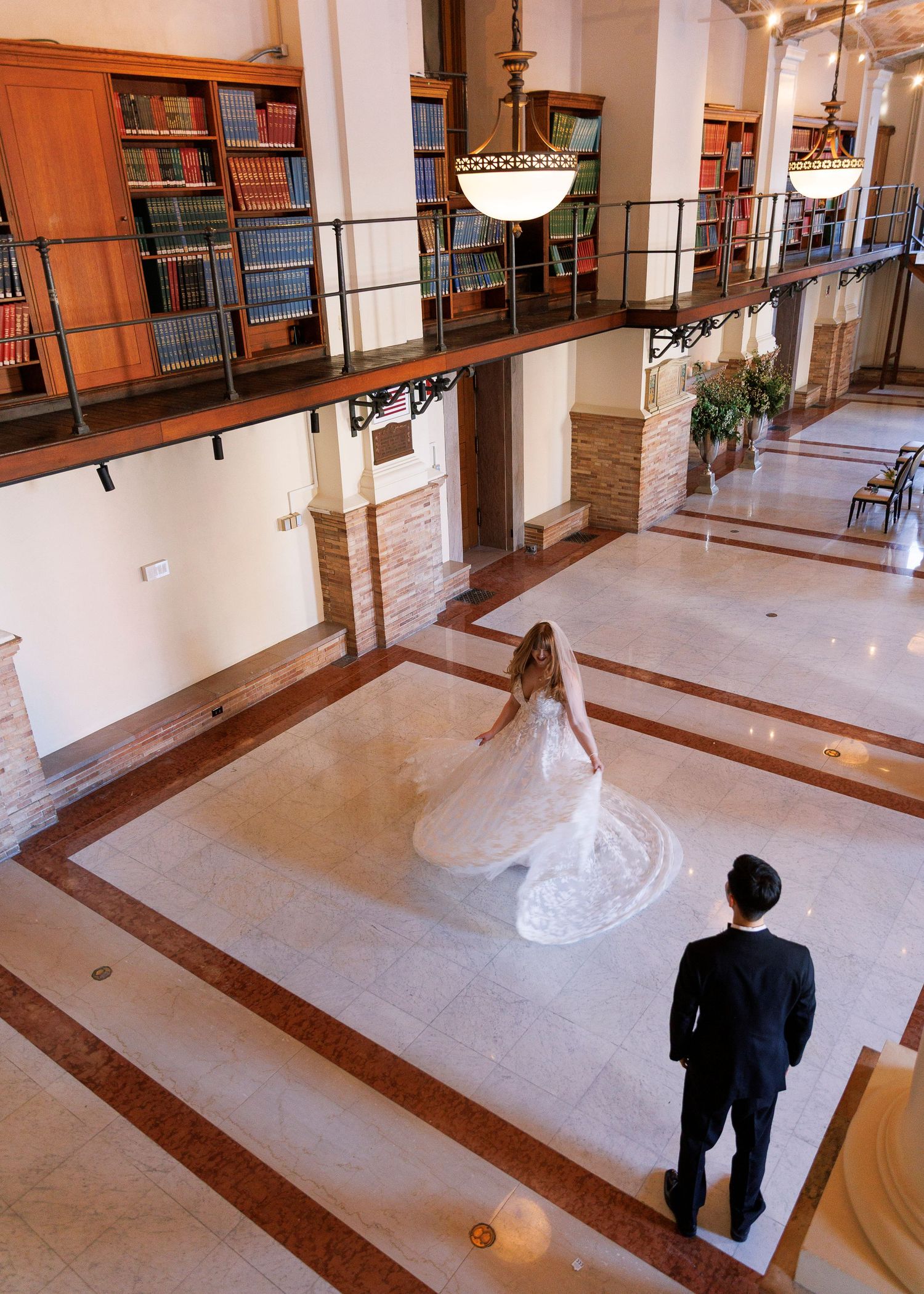 Boston Public Library Monday ceremony in the Guastavino Room, bride twirling in dress.
