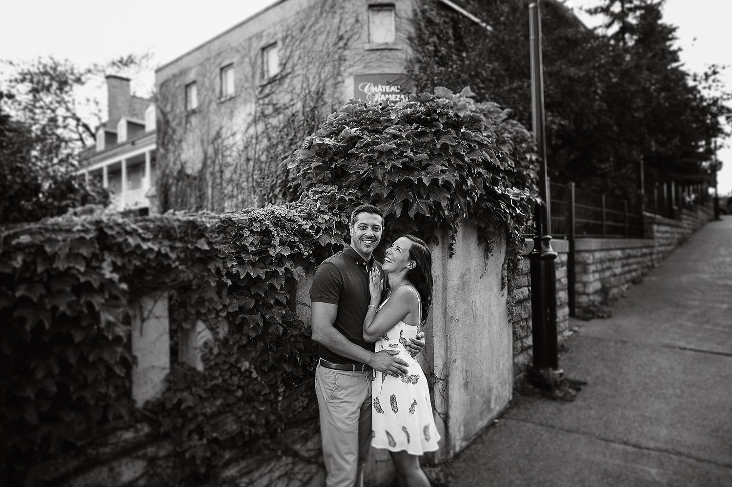 A collection of black and white photographs showing residential street scenes and buildings in an urban neighborhood.