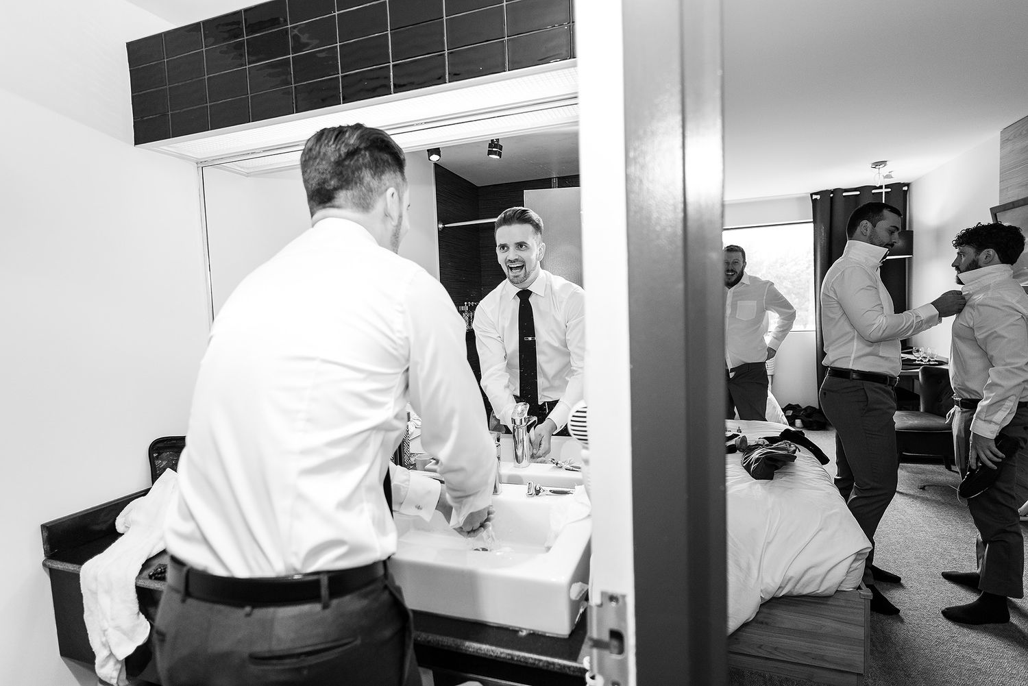 A series of black and white photos showing medical professionals working in a clinical setting with patients and equipment.