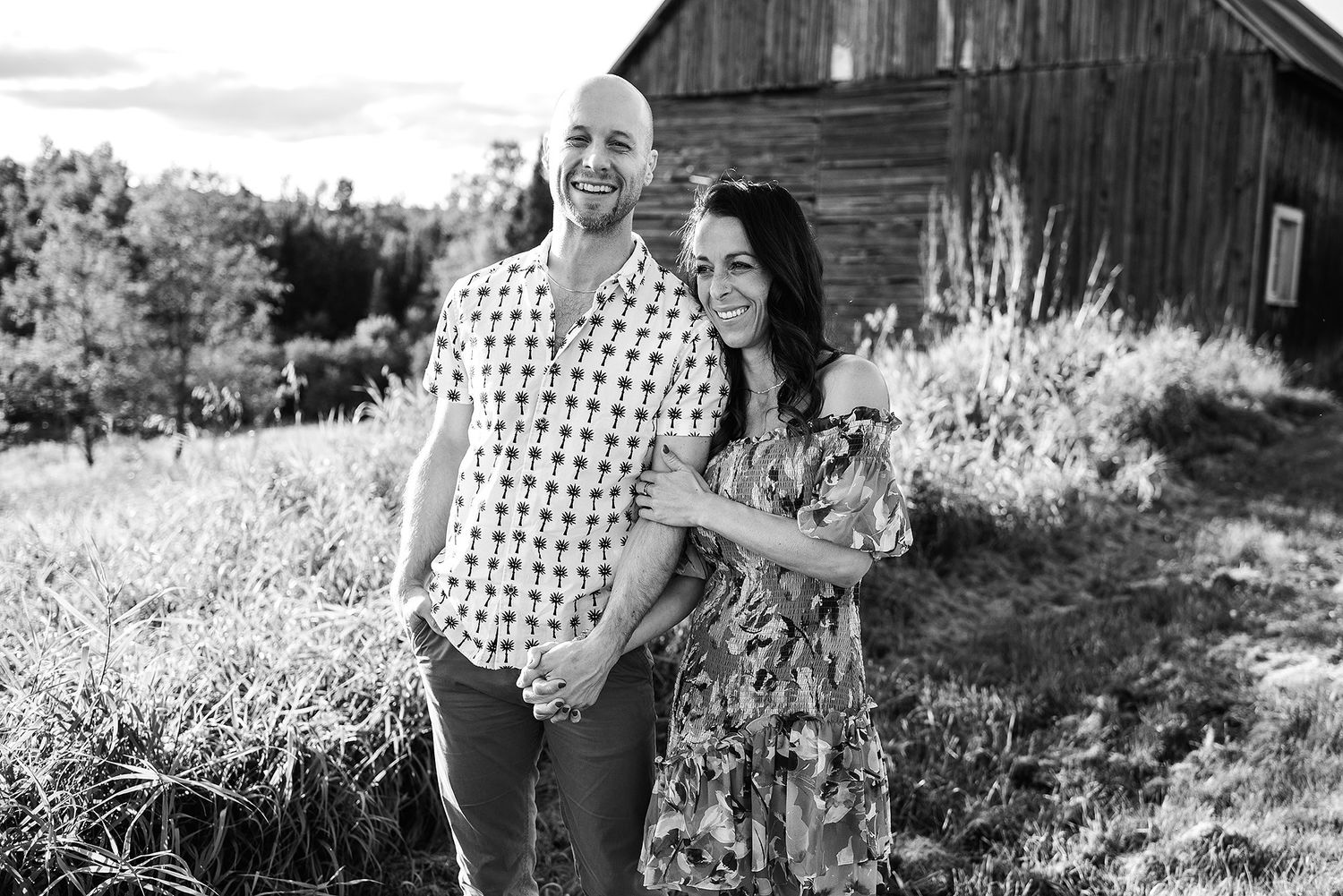 Black and white photo series showing candid moments in a rustic outdoor setting.