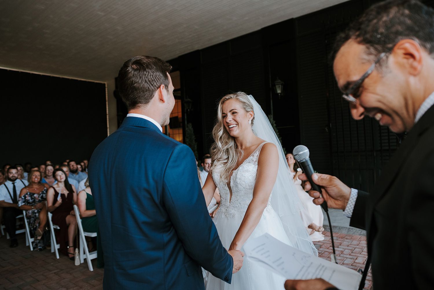 Romantic black and white wedding photos showing intimate moments between couples during their special day.