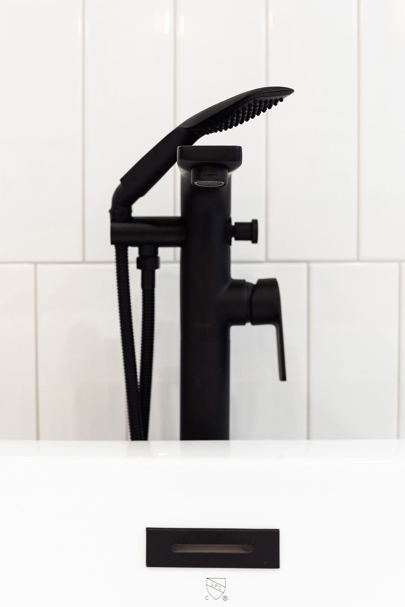 Black adjustable pipe wrench silhouettes shown in sequence against white background with tiled wall pattern.