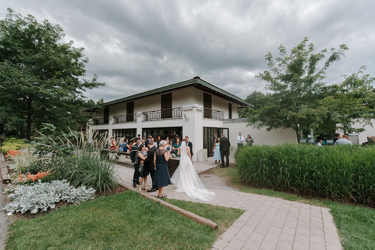 A collection of outdoor wedding ceremony photos showing scenic garden venues under cloudy skies.