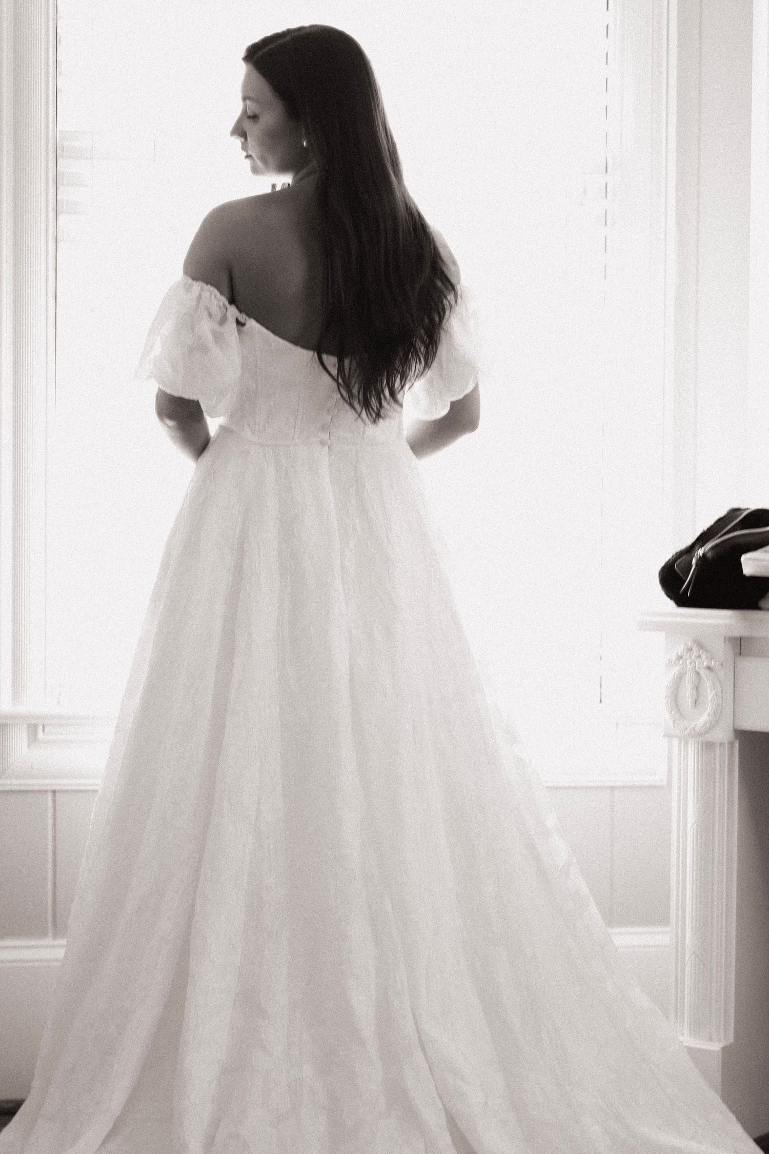 Ethereal bridal portraits showing the movement and details of a flowing white wedding gown.