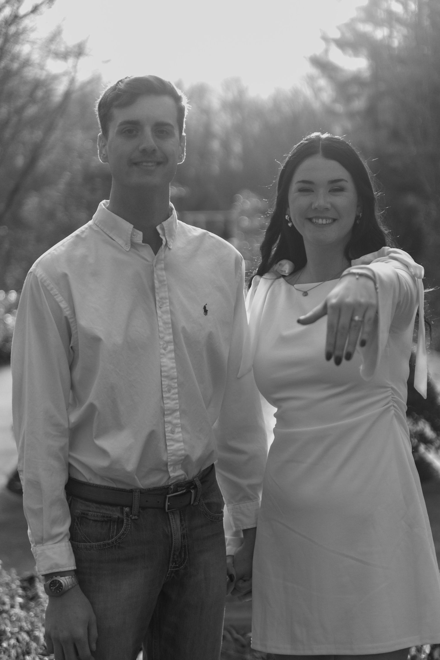 A sequence of black and white outdoor portraits showing a couple in casual attire.