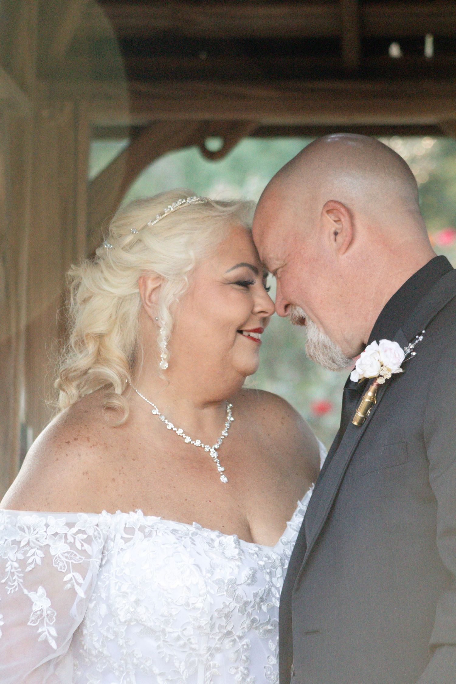 A romantic wedding photo sequence showing intimate moments between a bride in white lace and groom in gray suit.