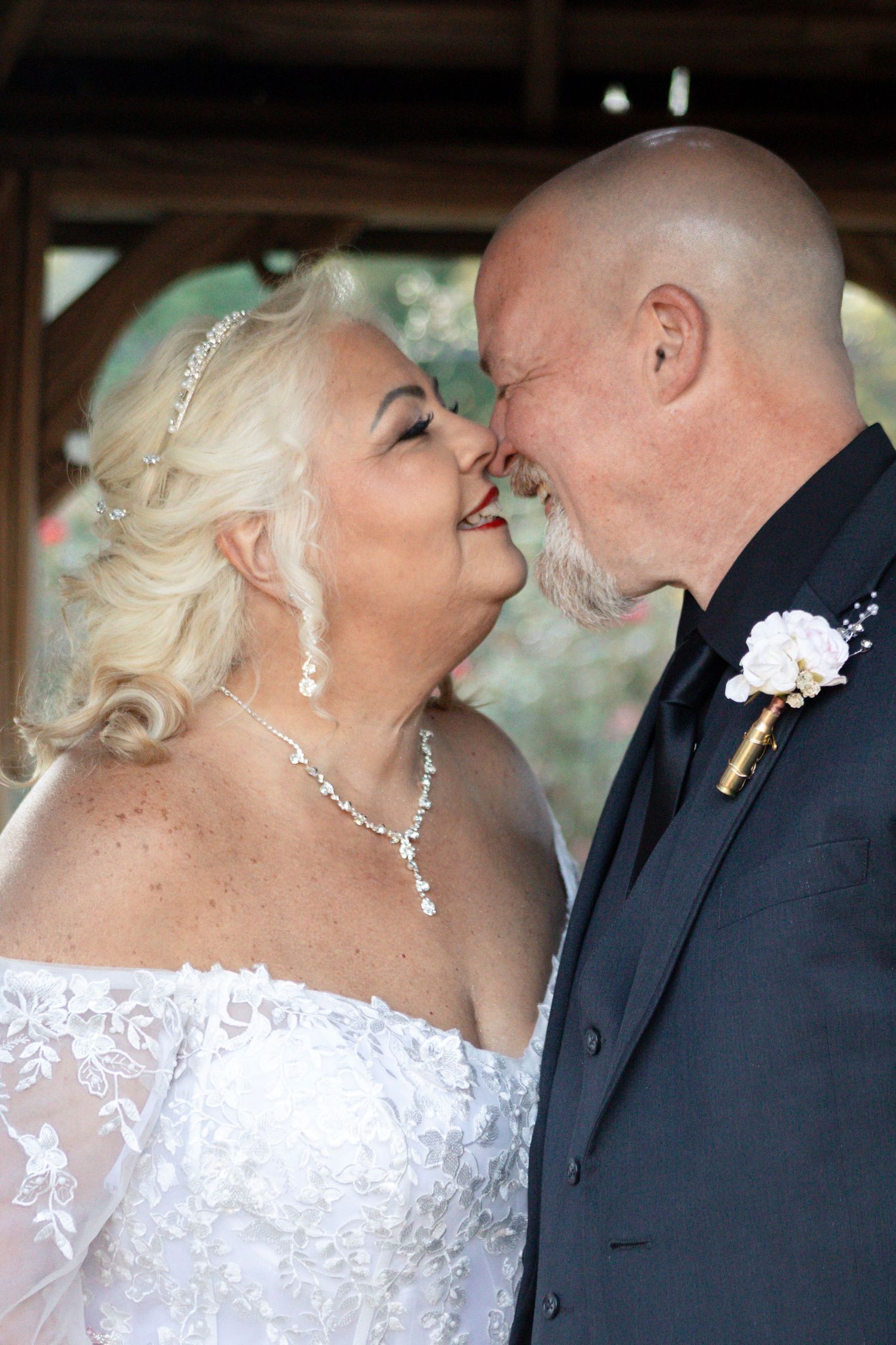 A romantic sequence of wedding photos showing a couple in formal attire sharing intimate moments and kisses.