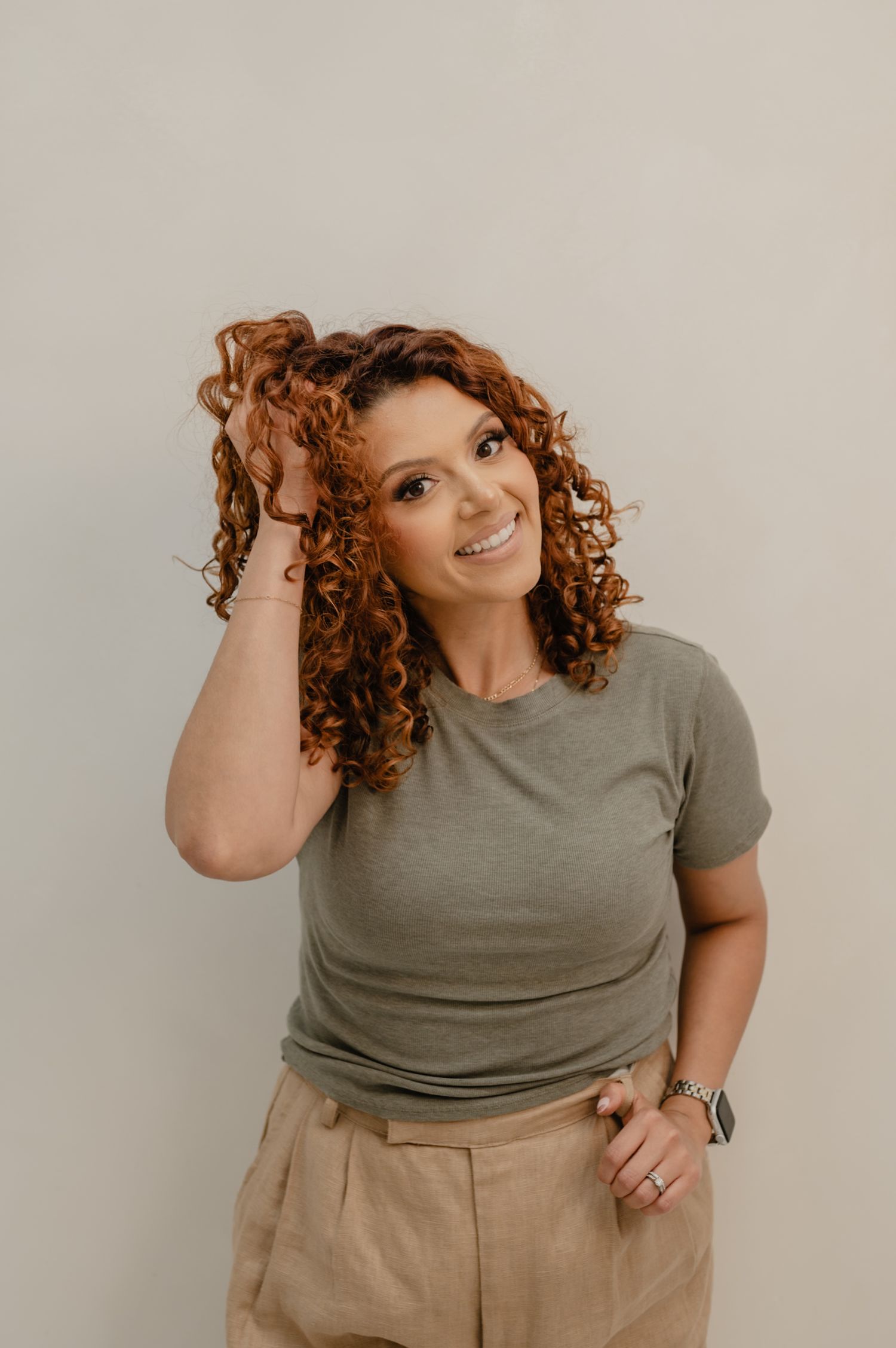 Relaxed and confident brand portrait of Serena Beach Hair, curly hair expert based in Peoria, Arizona.