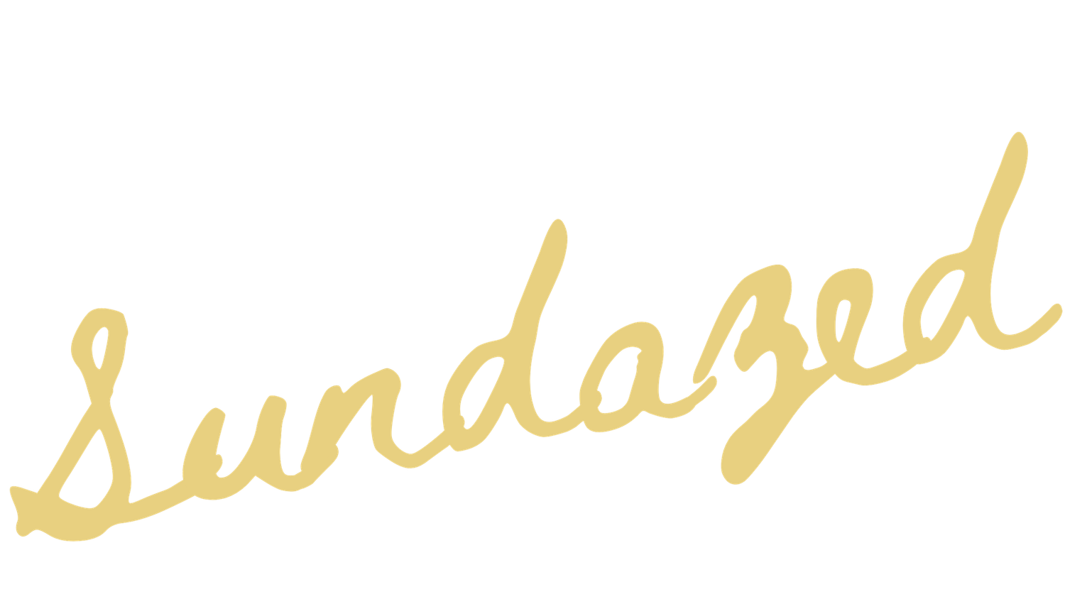Sundazed written in elegant gold cursive script on white background.