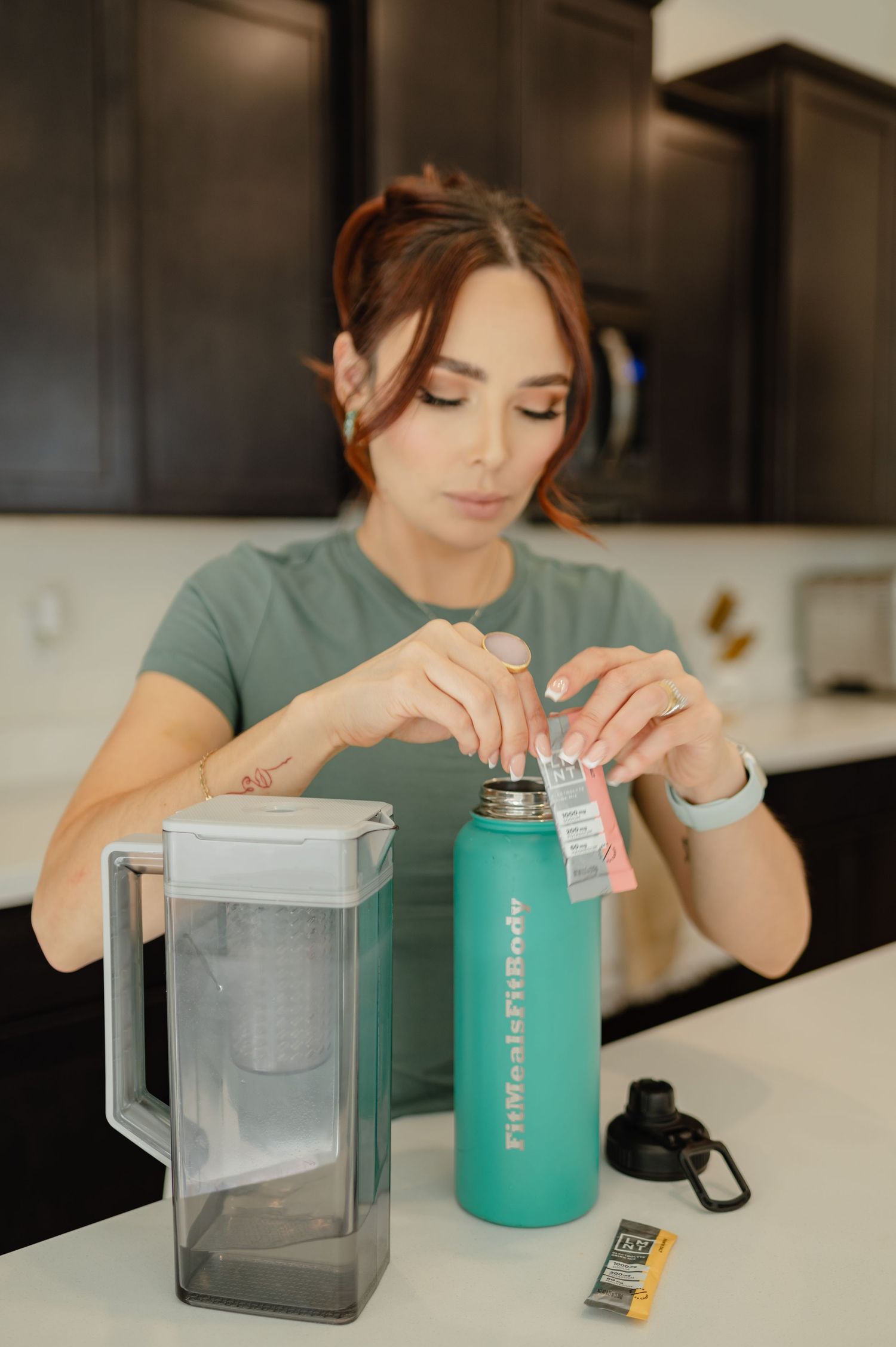 Diana enjoying a smoothie during her brand shoot, creating visuals for her wellness and nutrition program.