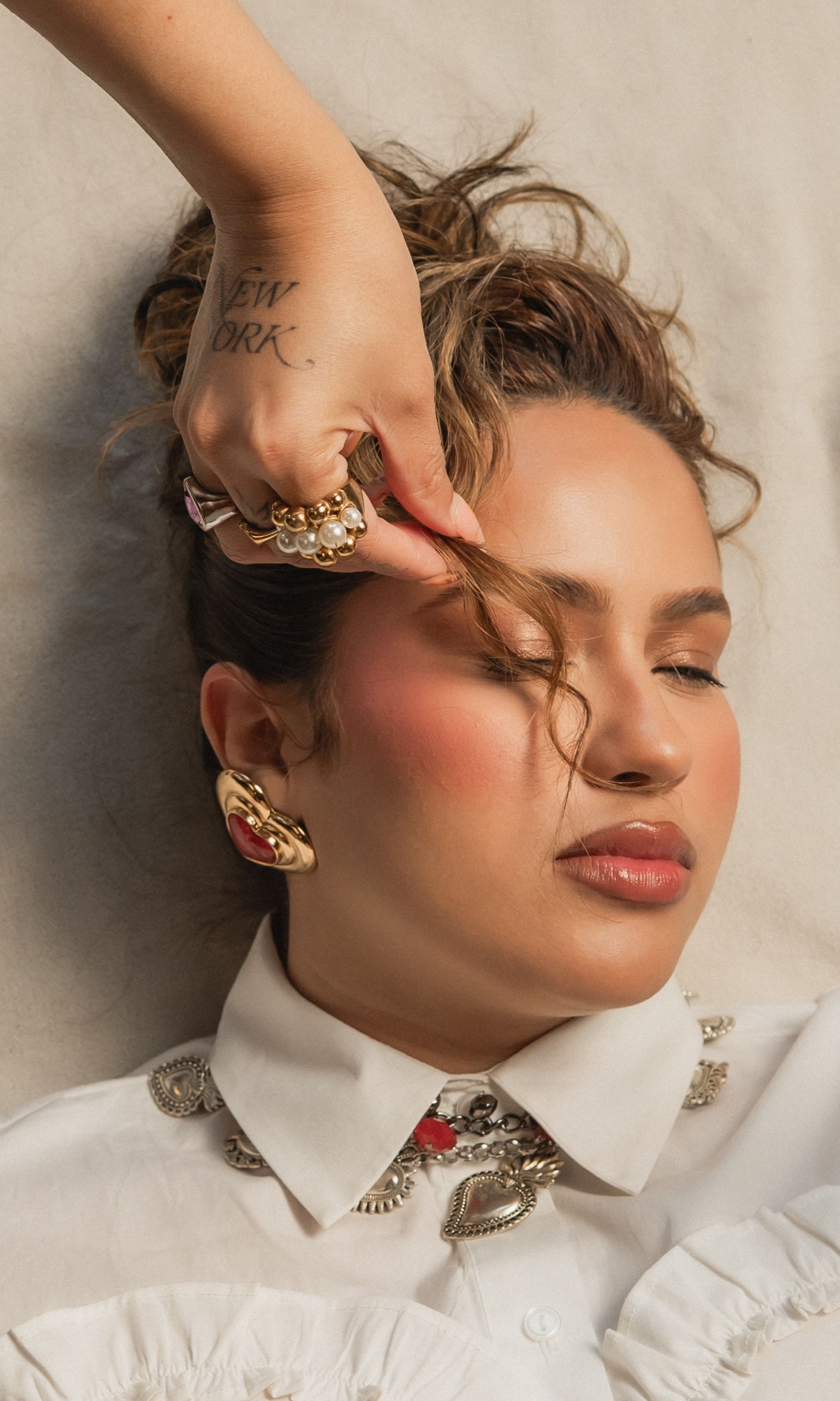 Nadia Vasquez, entrepreneur in phoenix, az during the personal brand session for the hive salon, posing with her eyes closed