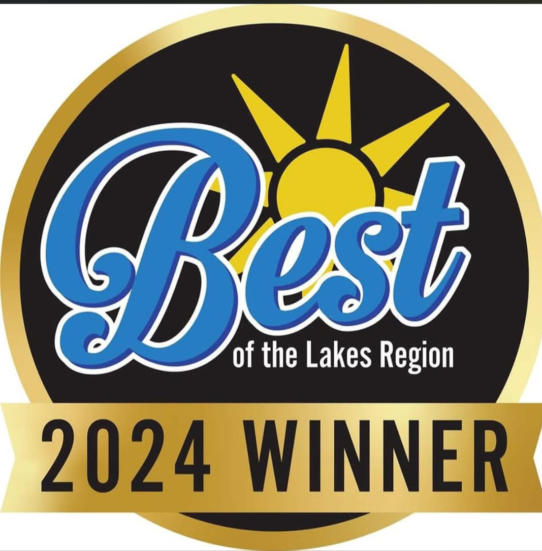 Best of the Lakes Region 2024 Winner badge with golden sun and blue script lettering.