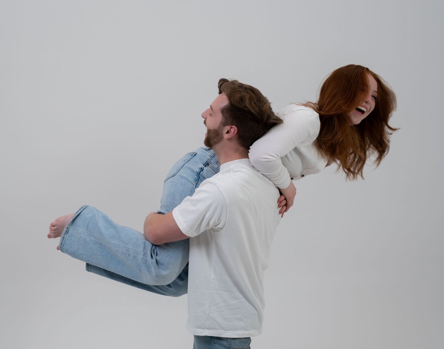 A series of dance movement photos showing a couple performing a dramatic dip against a light gray background.