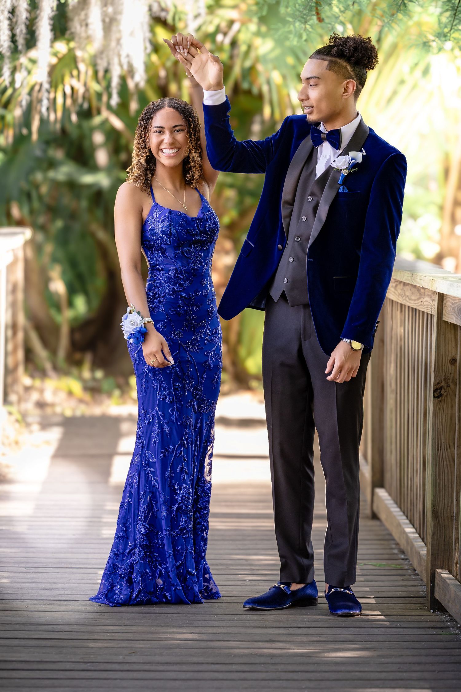 Elegant prom photo in a royal blue gown. Timeless style and joyful connections