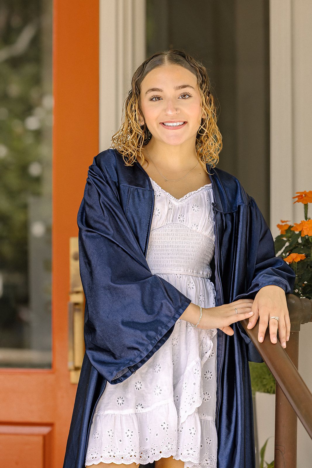 Joyful senior portrait in cap and gown celebrating achievement and new beginnings.
