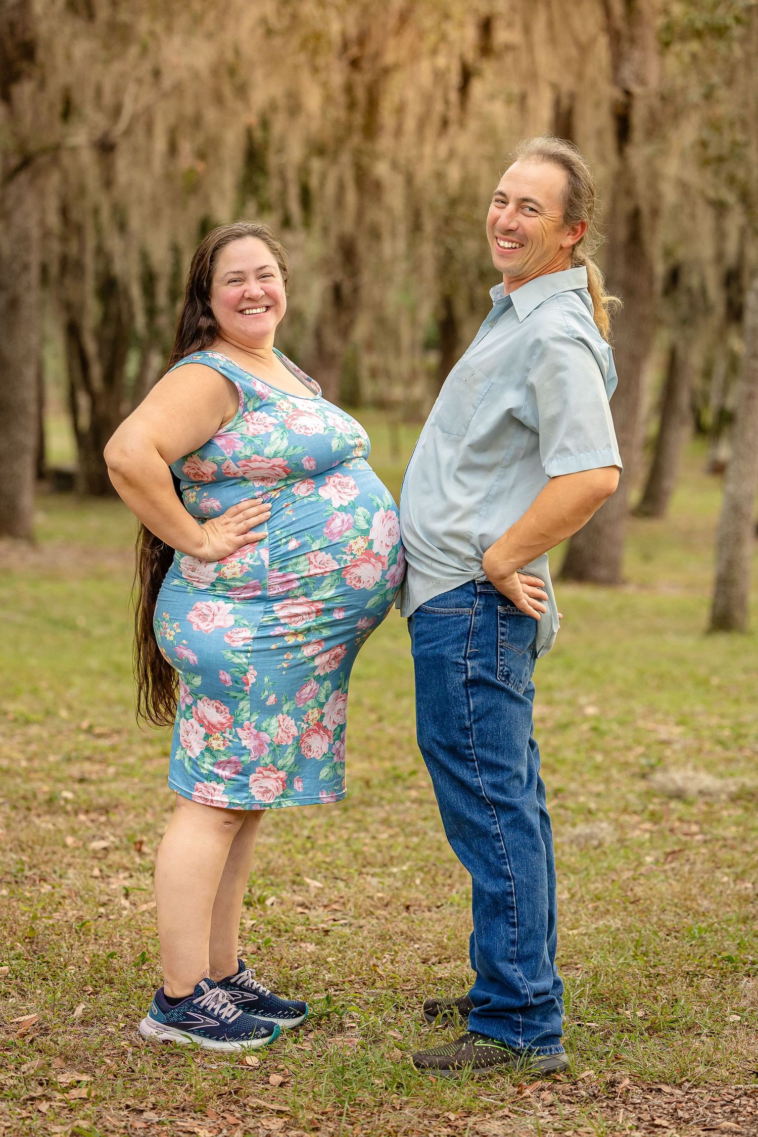 Fun outdoor maternity session showing laughter, love, and natural connections.
