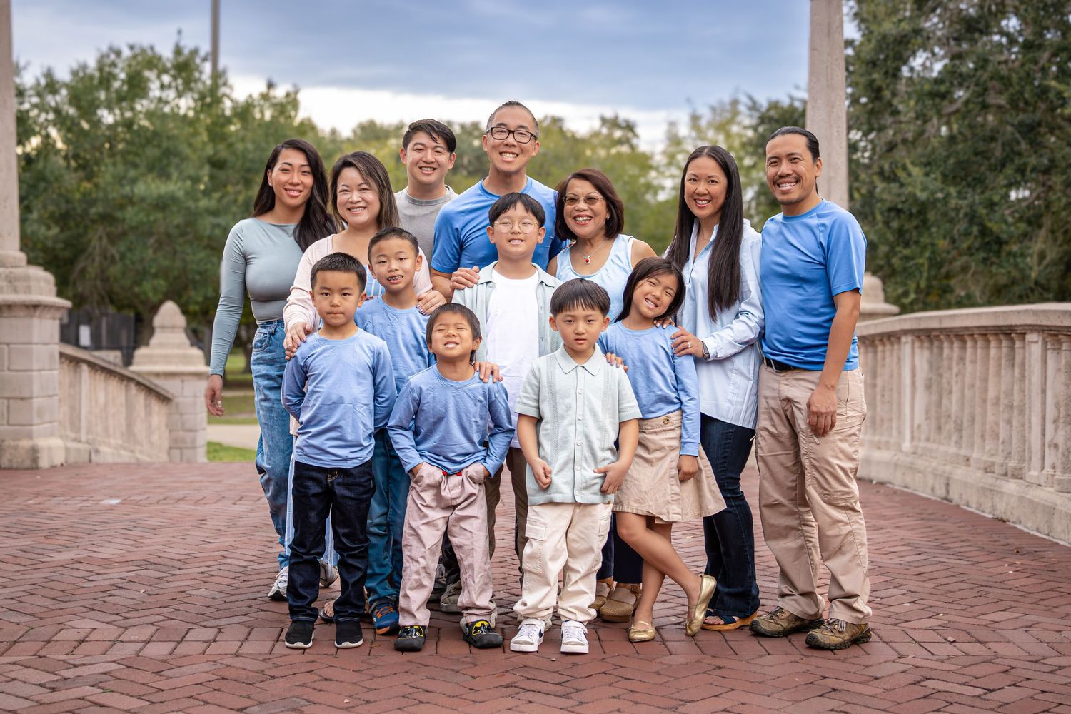 Large family photo showcasing connection, laughter, and togetherness outdoors.
