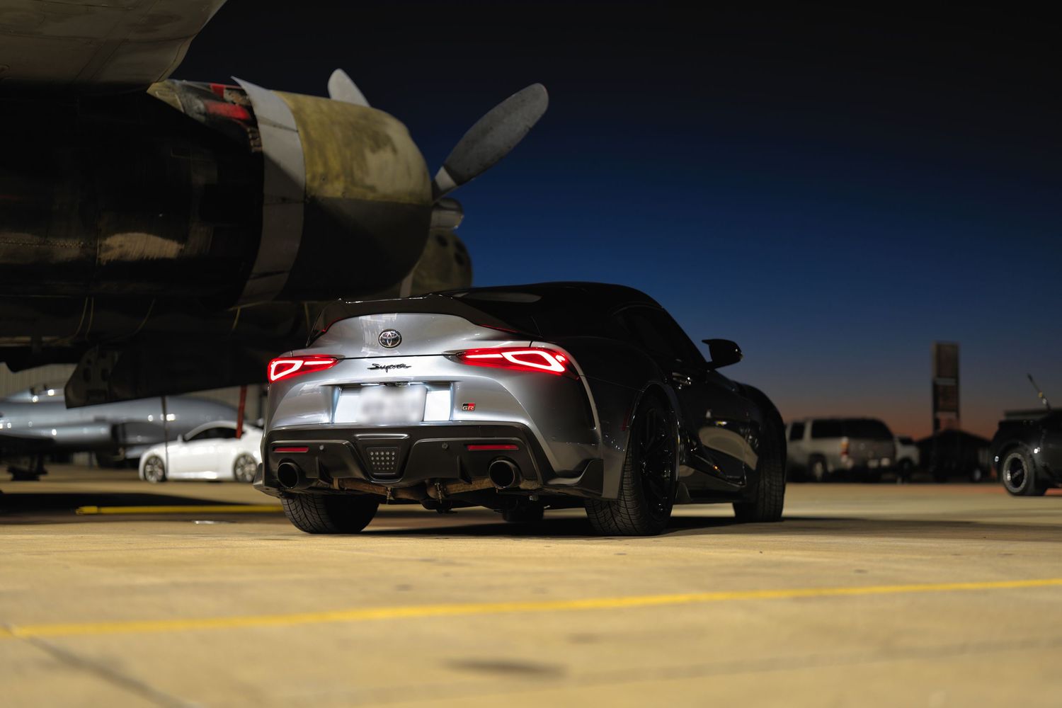 Toyota Supra MKV parked in the sunset.