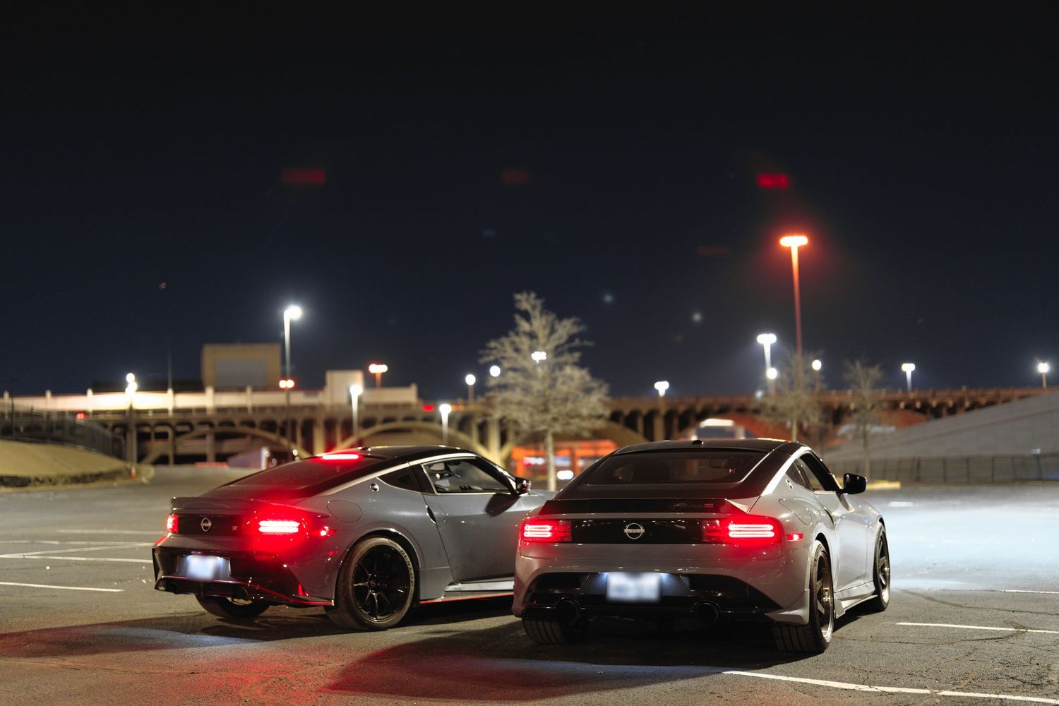Nissan Z cars parked in the city.