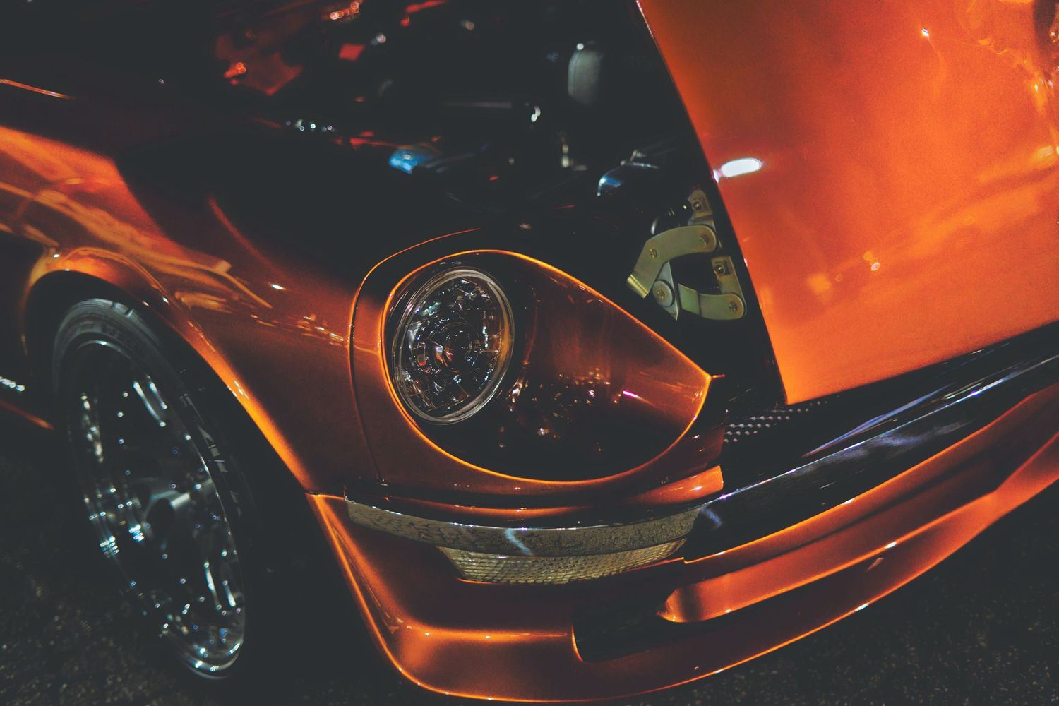Datsun 240Z parked at night.
