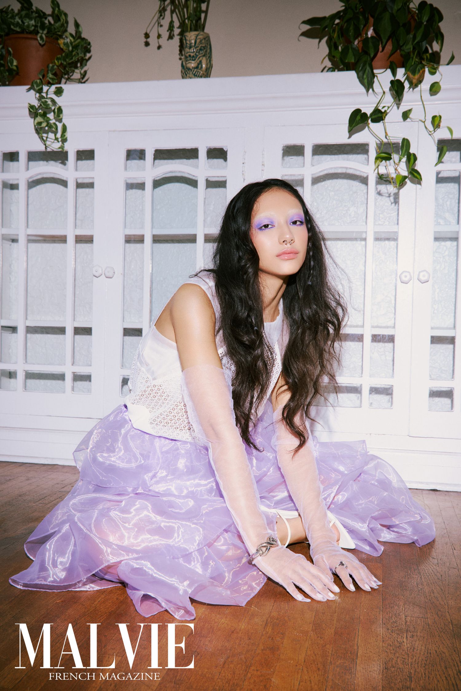 Editorial fashion shoot of a model wearing a lavender outfit, by LA photographer Belva Chan.